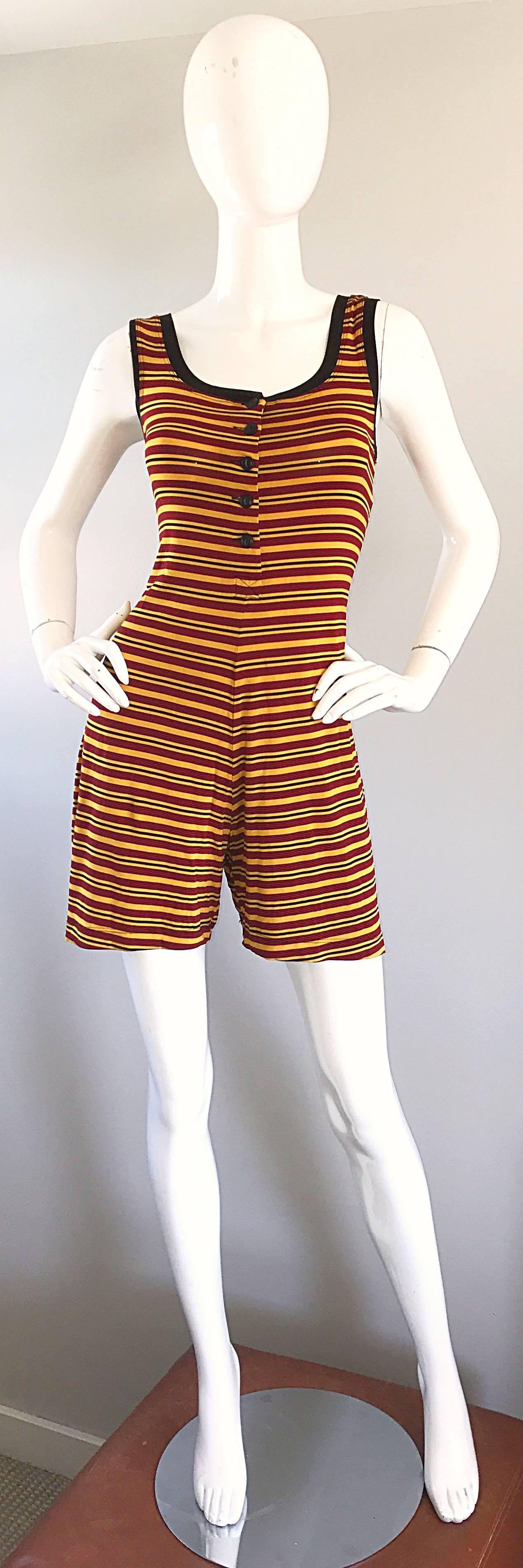 Chic 1990s does 1920 BETSEY JOHNSON yellow and burgundy striped romper, onesie, jumpsuit, or playsuit! Fantastic soft rayon jersey stretches to fit. Buttons up the bodice for controlled cleavage exposure. 1920s men's style. Great with sandals,