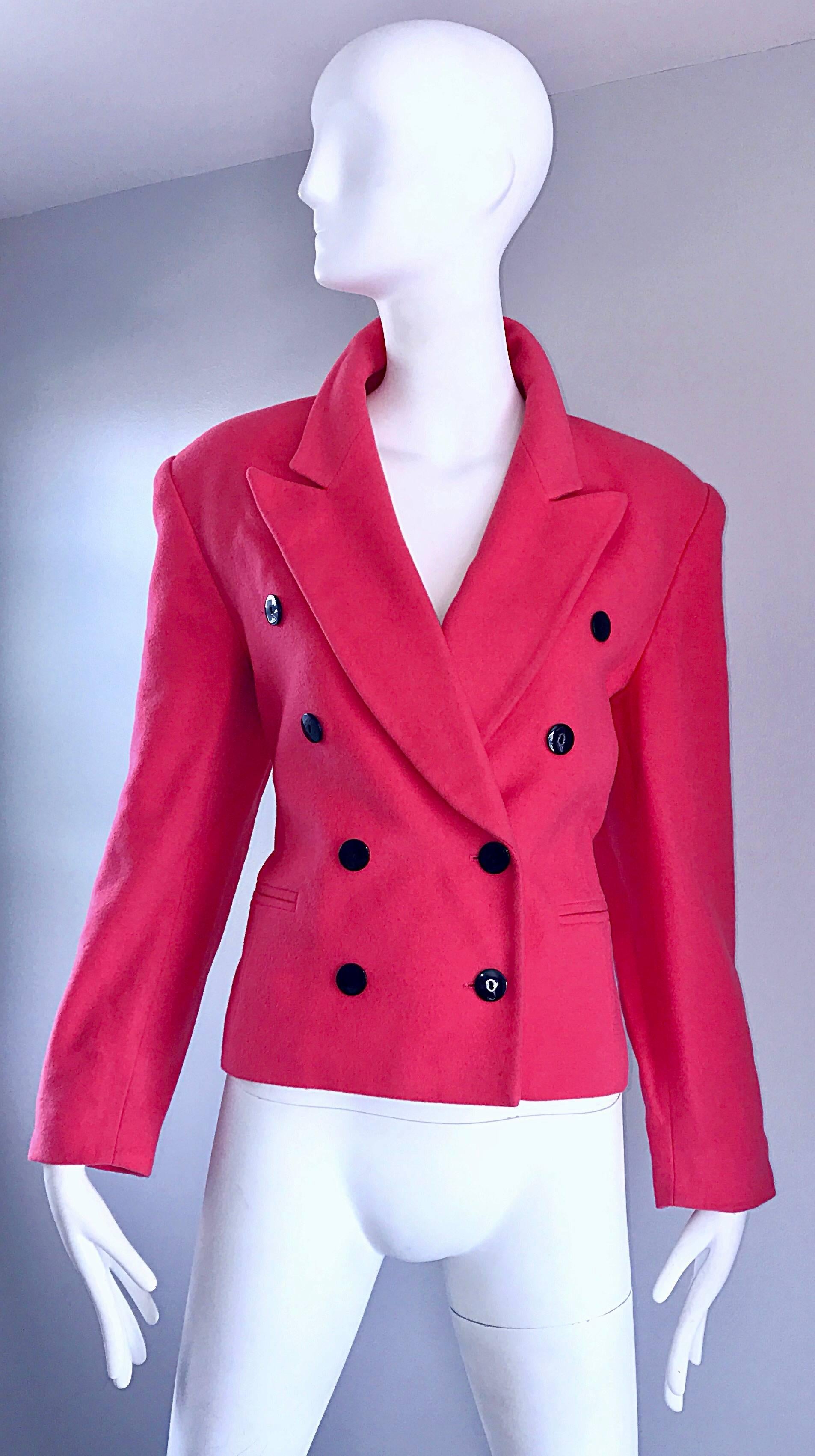 Wonderful vintage early 90s ESCADA by MARGARETHA LEY shocking hot pink cashmere and wool double breasted blazer jacket! Features contrasting black lacquer buttons up the bodice. Fully lined, with pockets at each side of the waist. Can easily be