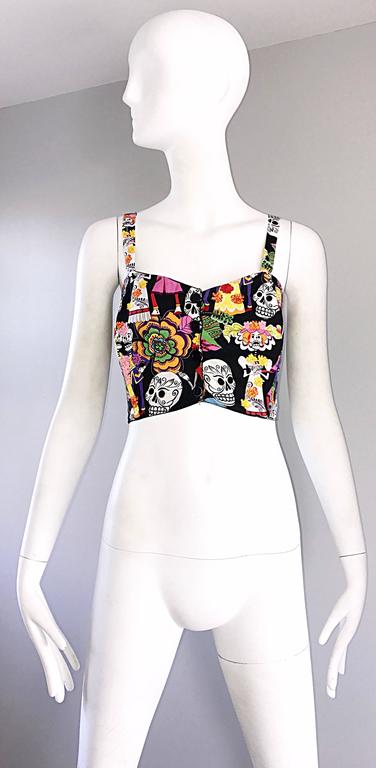 Amazing 1990s vintage 'Day of the Dead' novelty plus size crop top / vest! Features signature DOTD characters throughout. Four buttons up the front. Interior boning to keep everything in place. Amazing for BURNING MAN ! Great alone or layered over a
