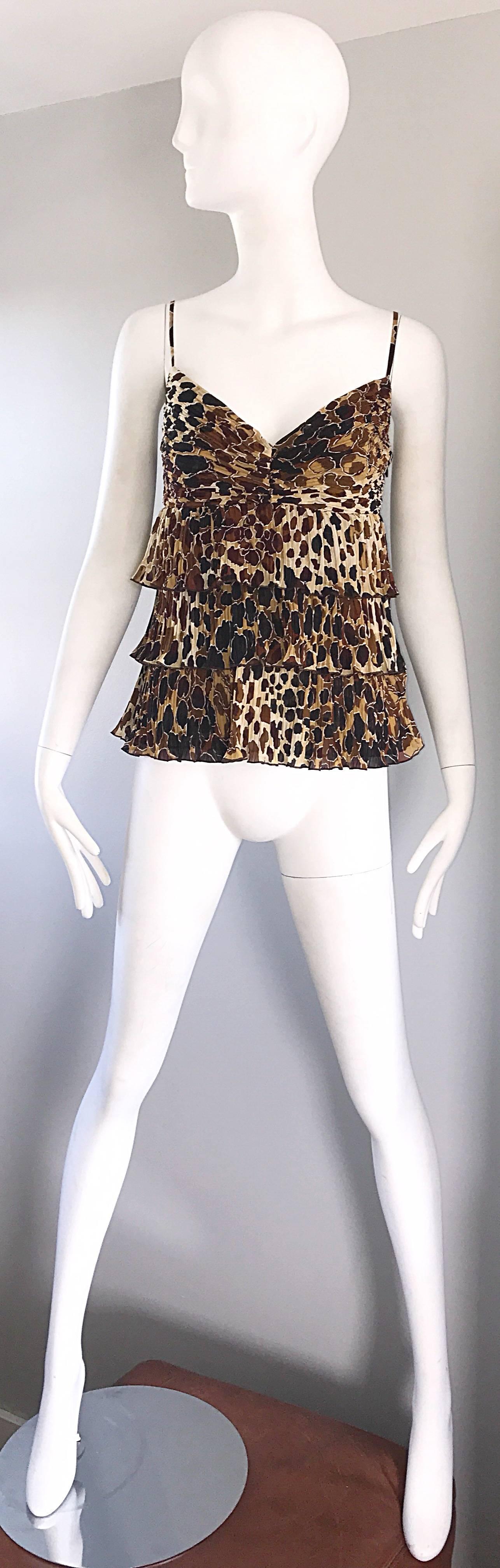 Chic new ESCADA leopard / cheetah print silk tiered pleated empire top! Three tiers, with accordian pleated silk. Beautiful leopard print in brown, beige, tan, light brown and black. Hidden zipper up the side with hook-and-eye closure. Excellent