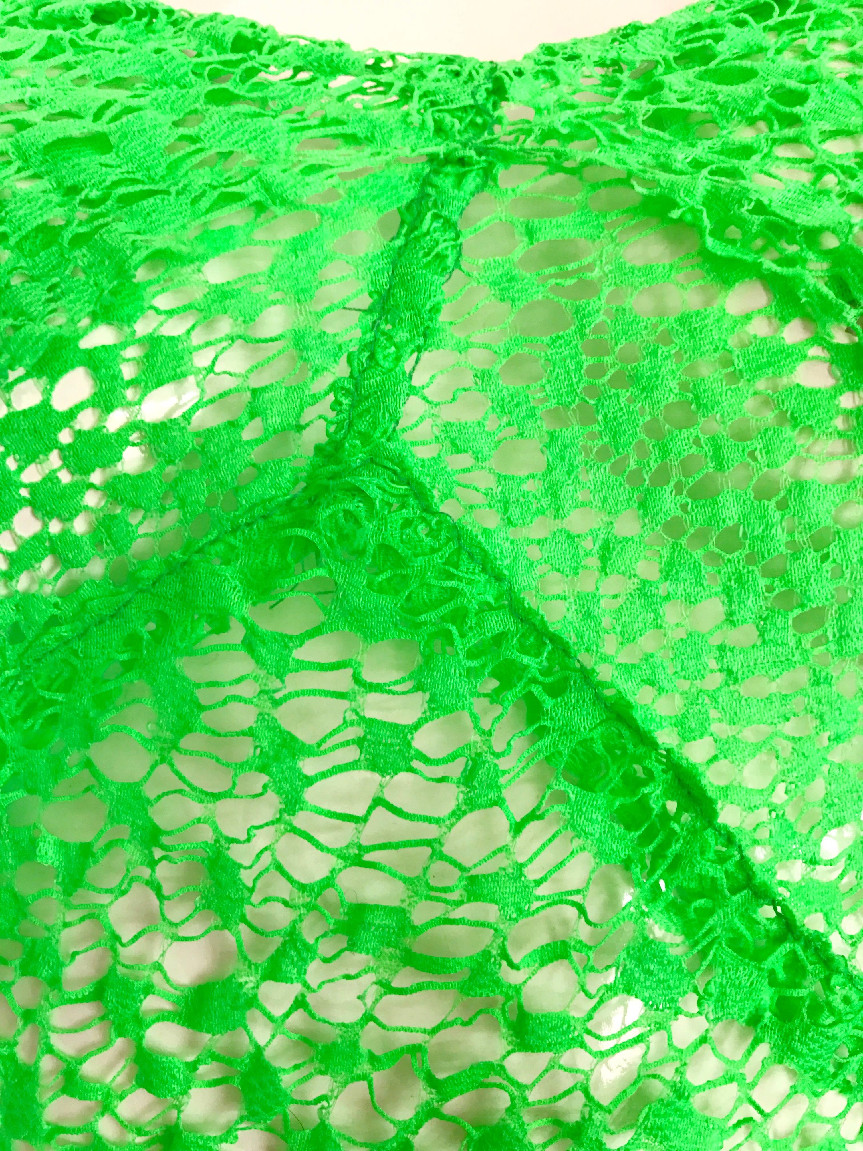 Amazing and rare 1930s neon green hand crochet bias cut gown! I've seen a lot of 1930s dresses, but never in this incredible color! Most likely used as a dress for a black and white movie in the early 30s. 
So much detail went into the construction