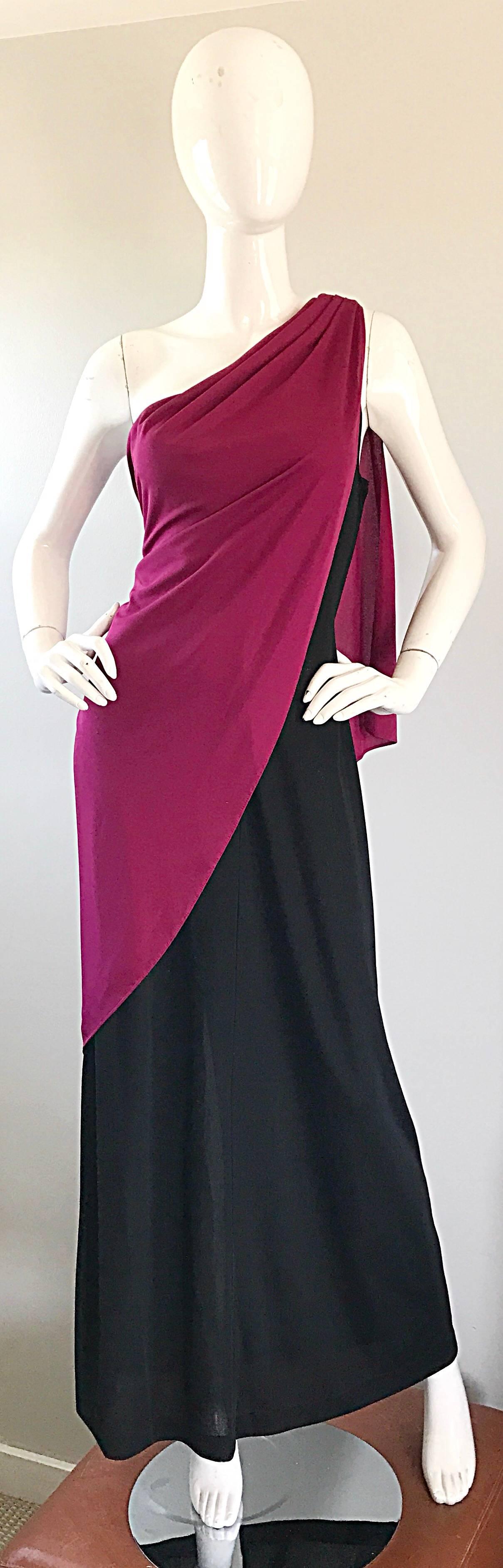 Amazing vintage BILL BLASS raspberry pink and black color blocked one shoulder Grecian evening dress! Features buttons at the top of the shoulder. Hidden zipper up the side. Flowy fit looks fantastic on! Great with sandals or wedges for day, and