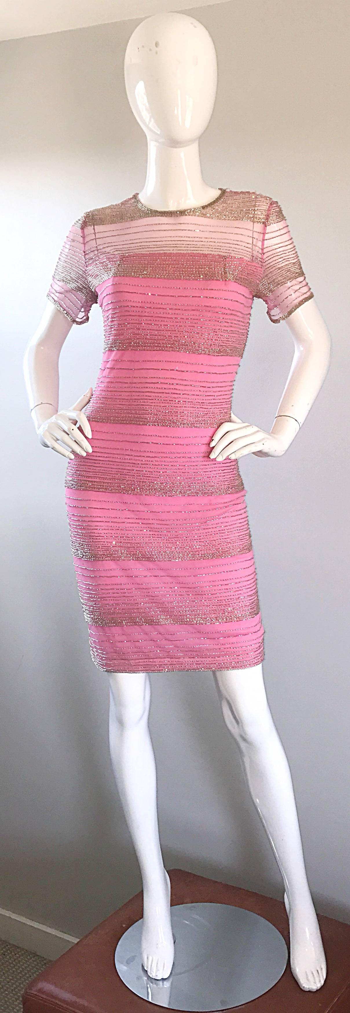 Beautiful vintage OLEG CASSINI bubblegum pink and silver silk beaded short sleeve cocktail dress! Wonderful tailored fit looks fantastic on! Features thousands of hand sewn silver beads throughout the entire dress. Semi sheer silk above the bust.