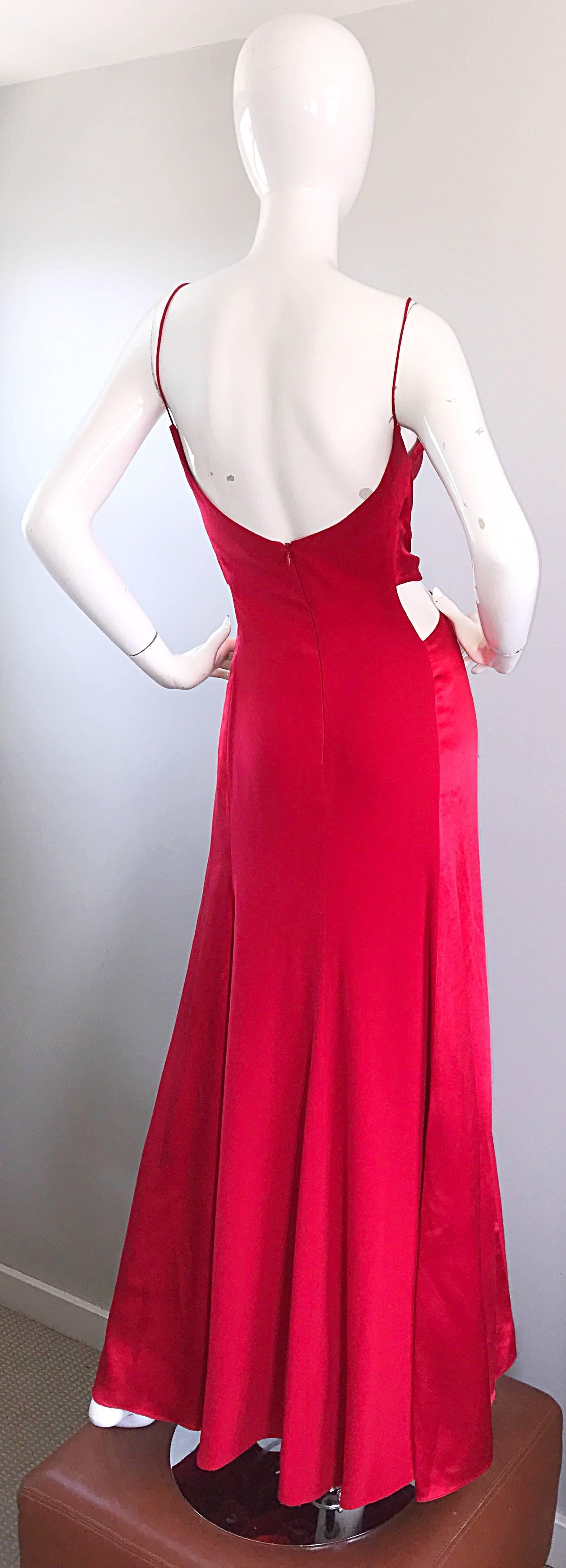 Beautiful sexy vintage 90s ANGEL SANCHEZ red silk and satin cut-out bias cut evening dress! Features a red silk body, with red satin bodice and side panels. Cut-outs at each side of the waist, and on the lower bodice. Hidden zipper up th eback with