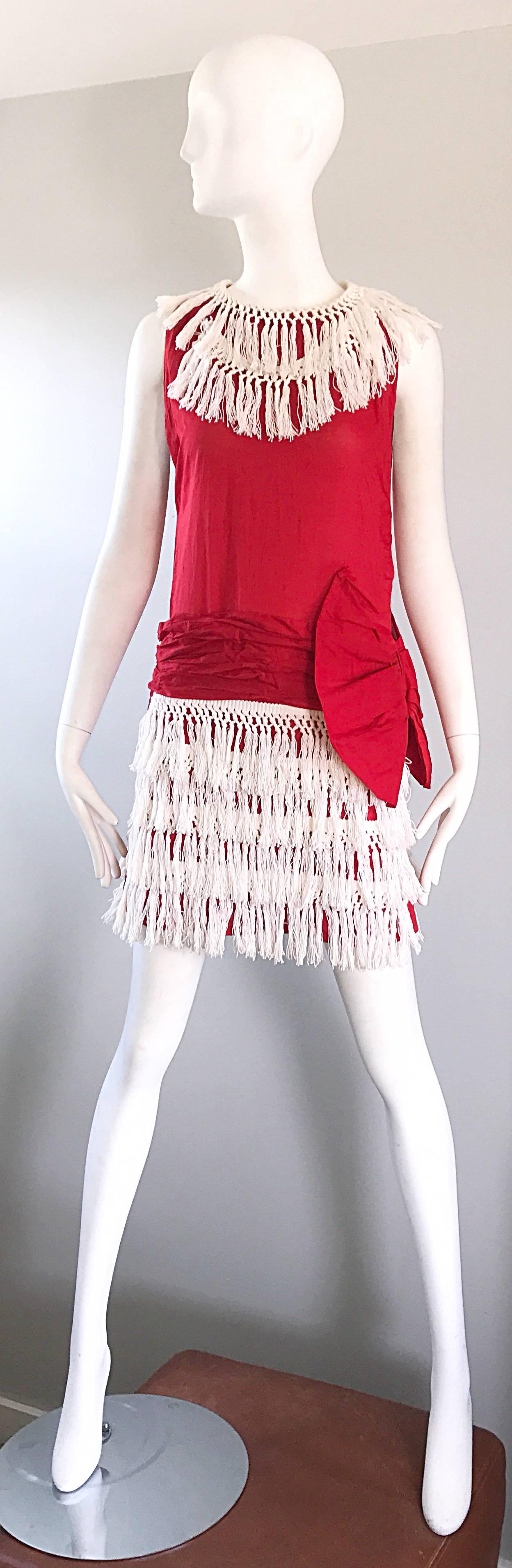 Amazing and rare 1960s does 1920 vintage 'Roaring 20s' demi couture dress! There is so much detail to this gem! Most of the sewing was done by hand. Intricate drop waist detail with an Avant Garde oversized bow. Panels of white fringe were hand-sewn