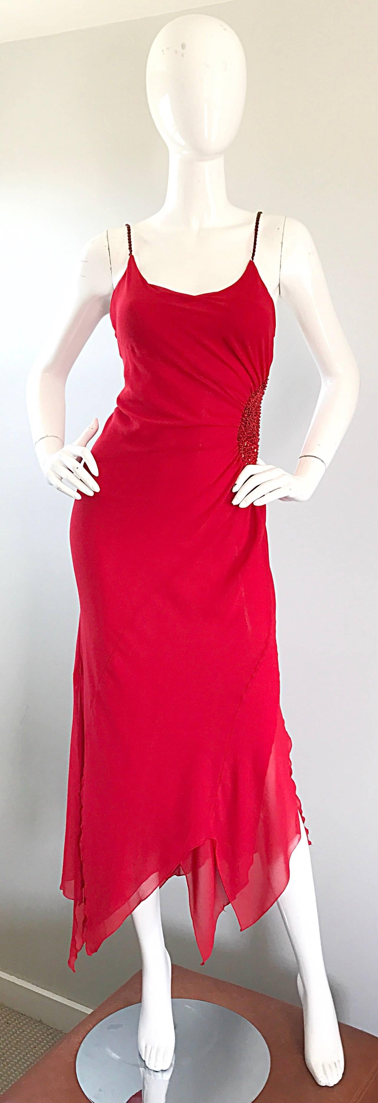 Sexy 70s lipstick red chiffon handkerchief asymmetrical hem sequin and beaded dress! Features red crystal beads on each spaghetti strap. Sequins and beads at left side waist. Flirty asymmetrical hem looks amazing with movement! Great quality, with