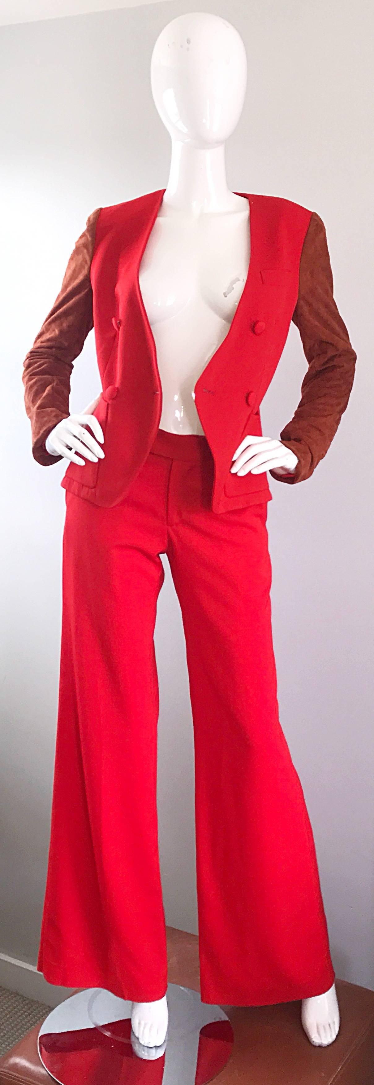 Stylish vintage 90s DOUGLAS HANNANT red wool and Burt orange quilted suede wide leg pant suit! Features a red double breasted fitted jacket, with flared leg trousers. Sleek tailored fit on the blazer and pants. Burnt orange quilted suede leather