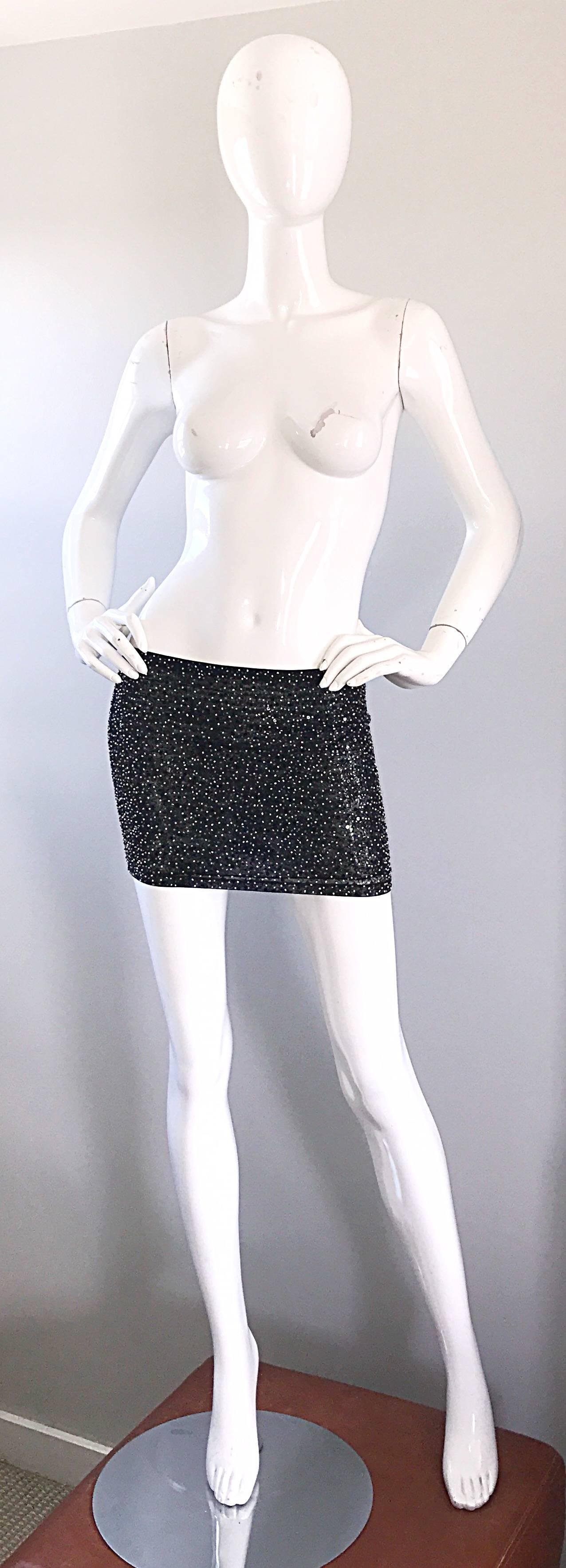Sexy vintage KIRIZIA 90s beaded mini skirt! Thousands of hand-sewn brown, black and silver seed beads on a black soft nylon and rayon mesh blend fabric. Meant to be a mini skirt, but can easily be worn as a tube top, given the stretch (see photo).