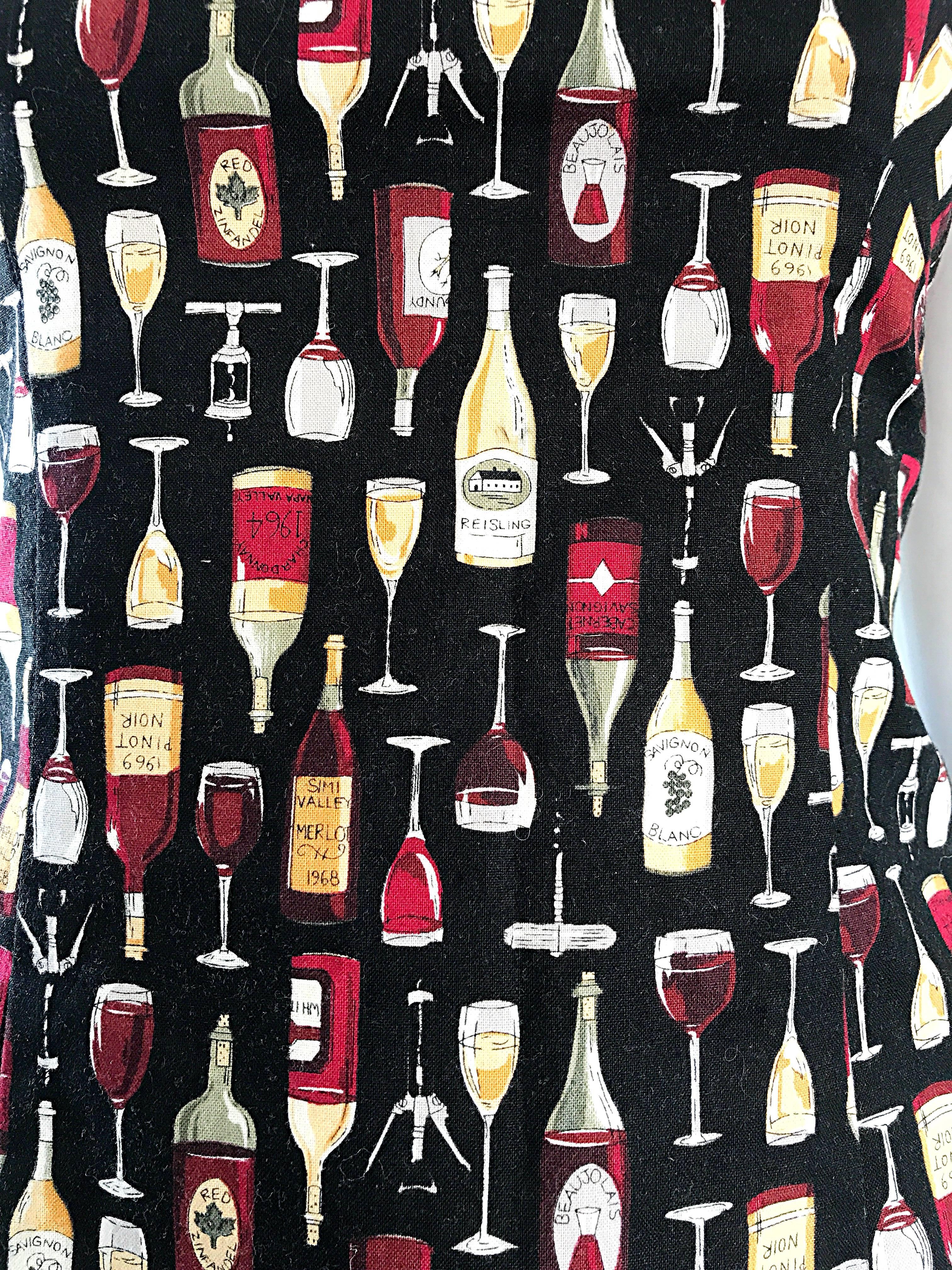 Calling all WINE LOVERS!!! Amazing early 90s novelty print mini dress with an allover print of red and white wine bottles and glasses! The perfect statement piece that looks amazing on! Sleeveless style with a fitted bodice and the slightest flared