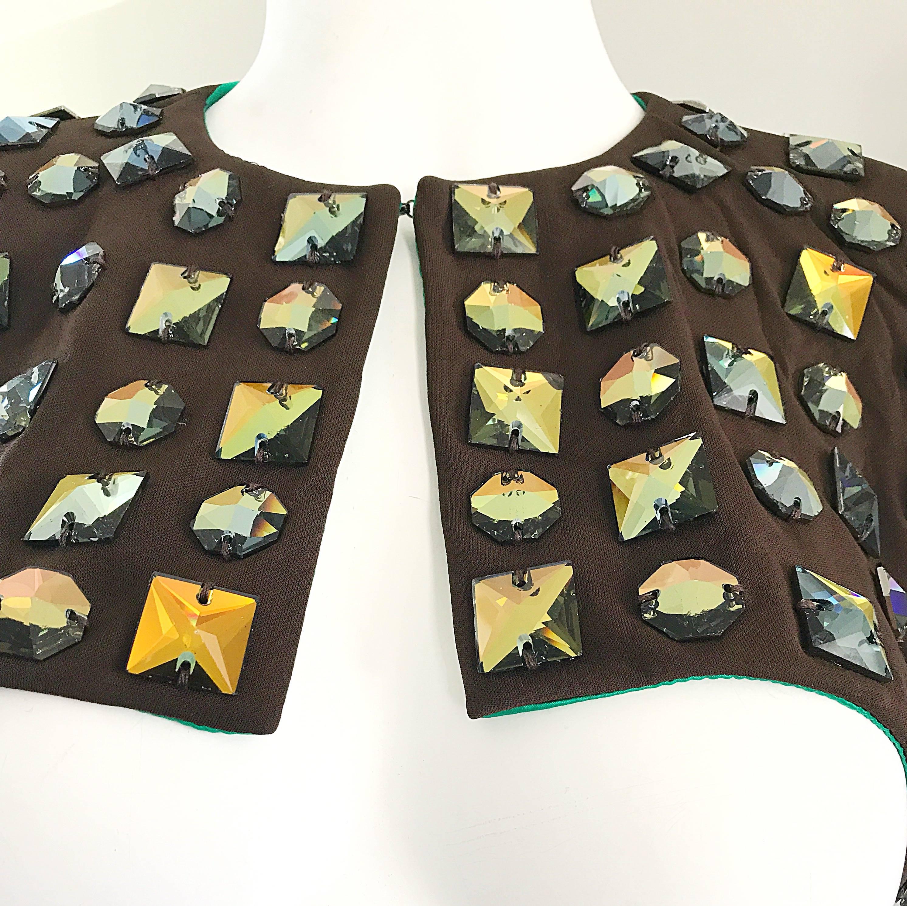 Fabulous vintage early 2000s Y2K C.D. GREENE COUTURE  chocolate brown heavily embellished cropped bolero jacket! Features hundreds of heavy duty multi color square and heaxago crystals throughout. The crystals shine beautifully when hit with light!