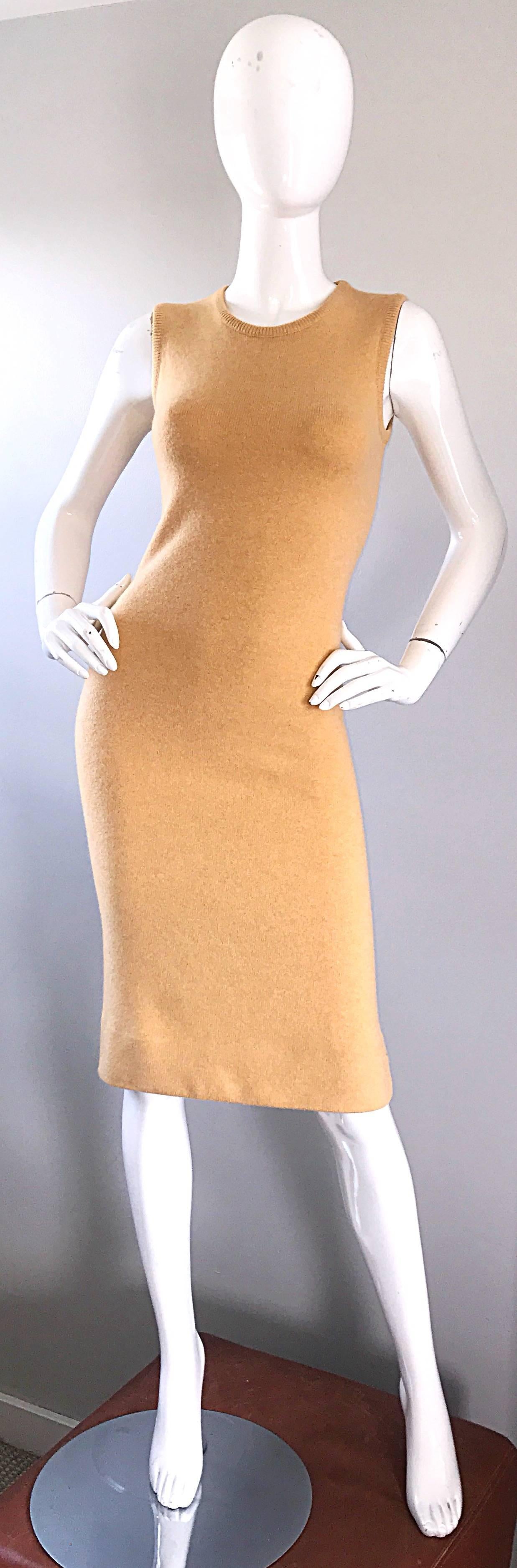 Classic and chic mid 70s HALSTON cashmere camel colored dress! Signature Halston cashmere piece with the most luxurious soft Scottish cashmere. Sleek tailored fit that looks amazing on! Simply slips over the head and stretches to fit. The perfect