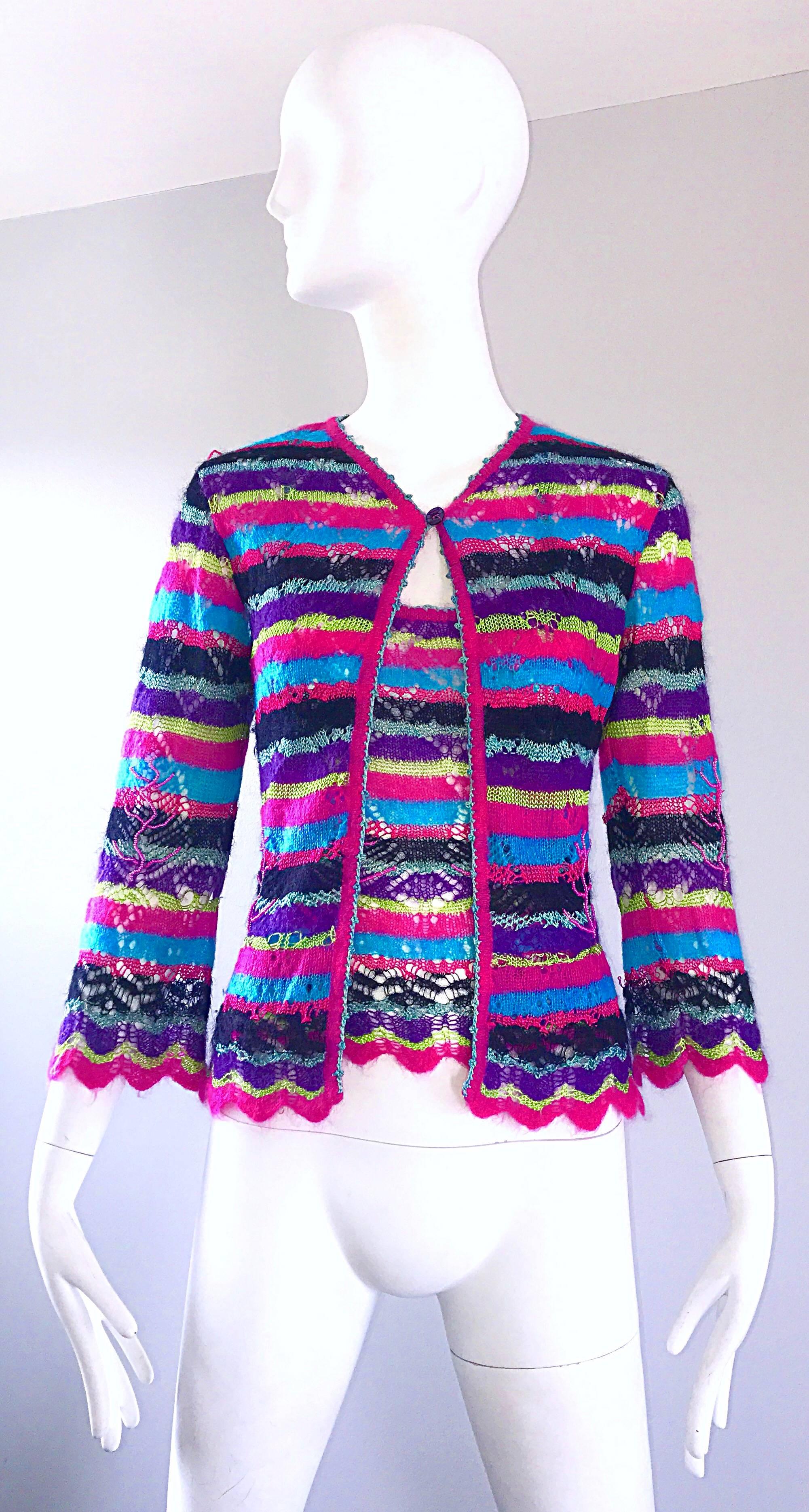 Unbelievable vintage CHRISTIAN LACROIX early 90s beaded crochet sweater twin set! Features allover stripes in vibrant hues of pink, purple, chartreuse green, teal blue and black throughout. Crochet work throughout, with pink seed beads on both the