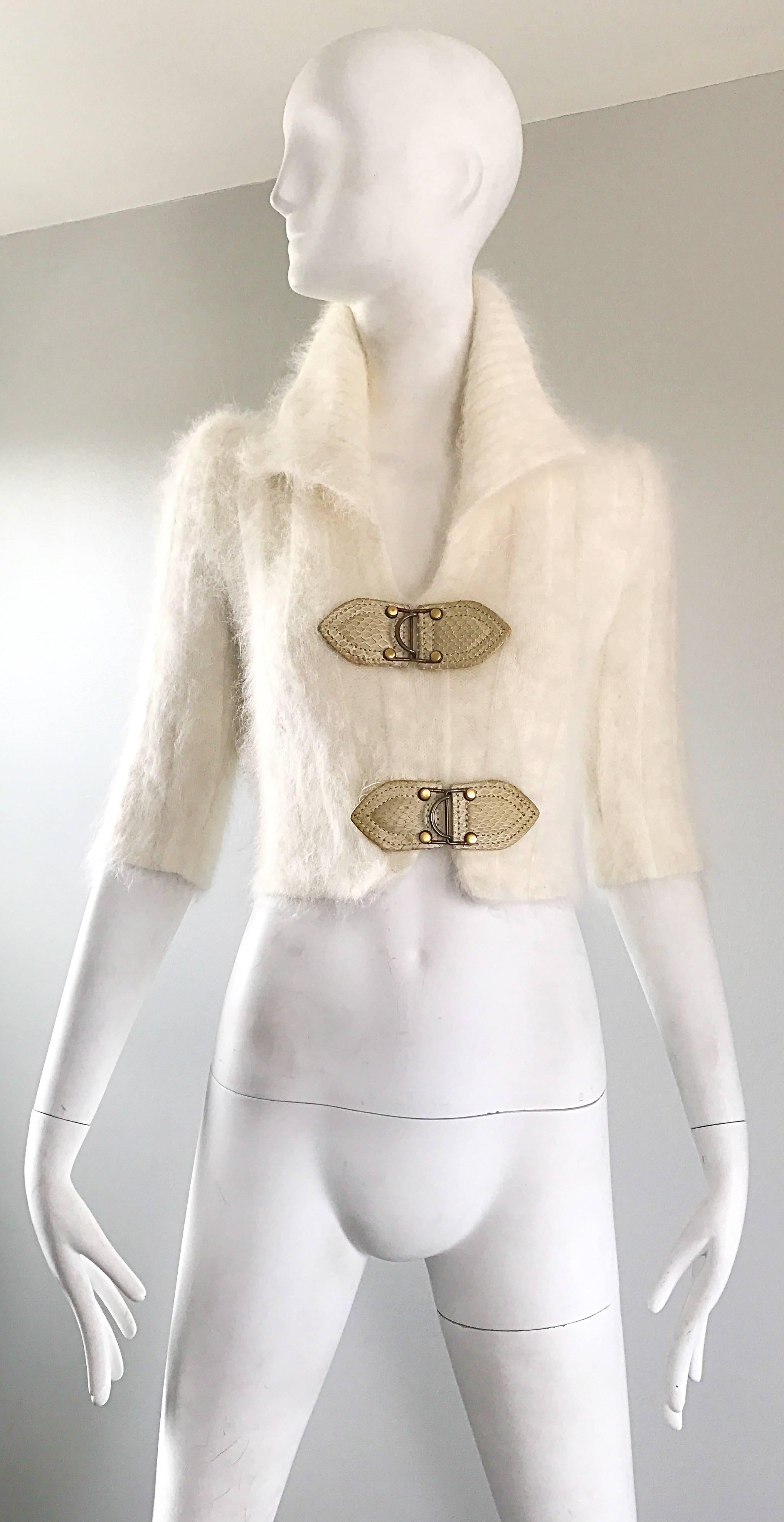 Chic ZAC POSEN ivory / off-white 3/4 sleeve crop sweater top! Features the softest angora and two beige snakeskin clasps on the bodice. Collar can be worn up, or laying flat. Great with shorts, jeans, trousers or a skirt. 
In great condition. Made