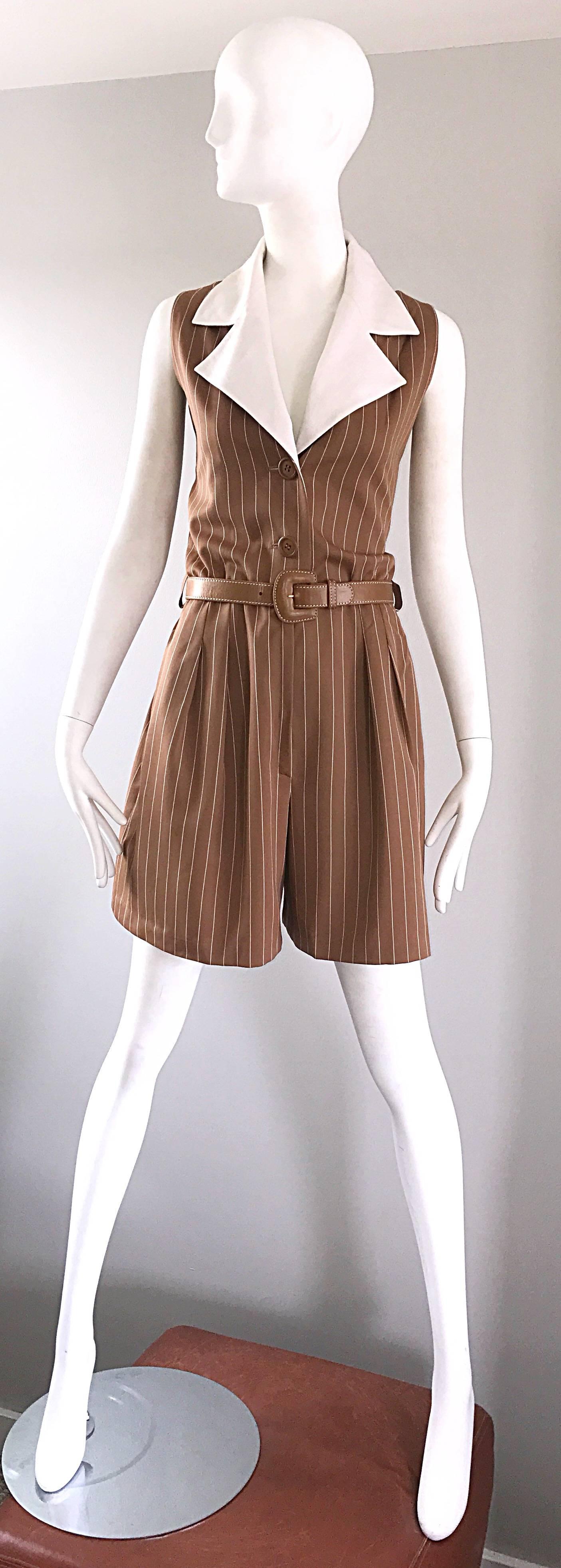 Rare vintage early 90s GIVENCHY COUTURE numbered one piece collared romper playsuit! Light brown color with vertical white pinstripes throughout. Matching oversized white lapels and collar. Buttons up the bodice, with hook-and-eye closure and zipper