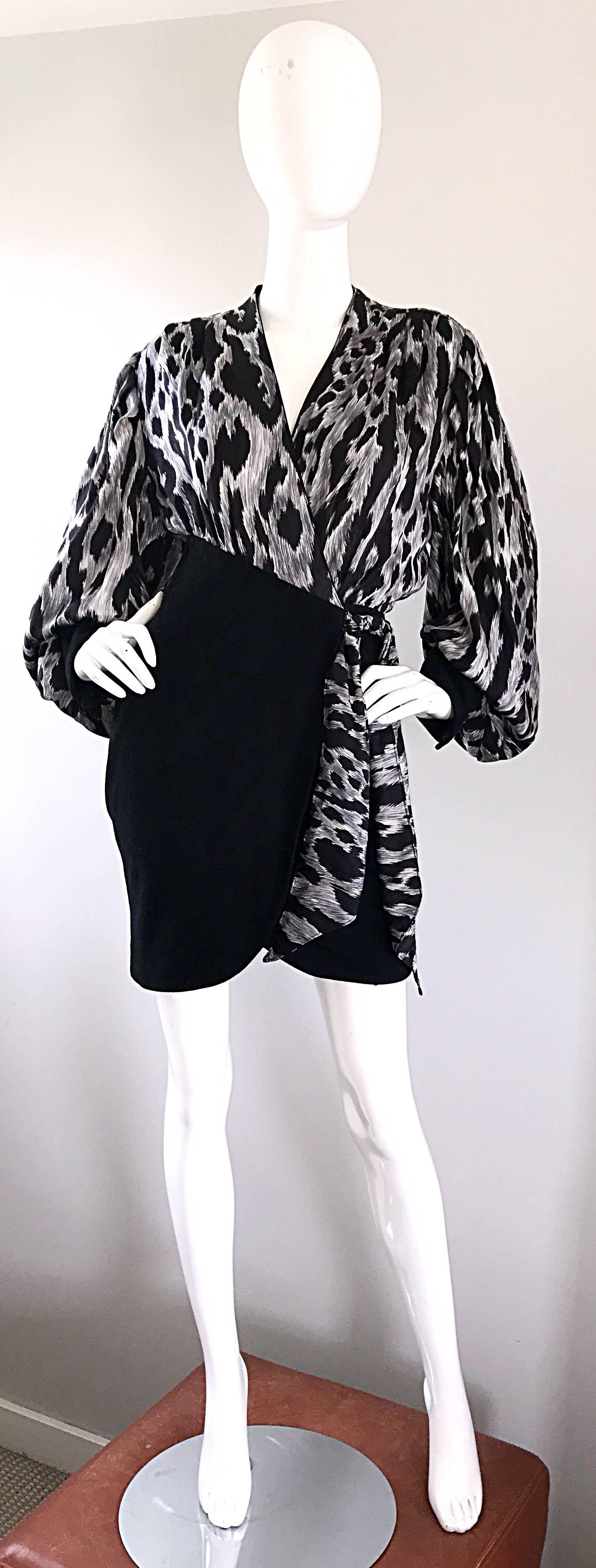 Sexy vintage 1990s JEAN-CLAUDE JITROIS black, white and gray snow leopard print silk and leather suede wrap mini dress! Features a fabulous low cut silk bodice with attached wrap tie that ties at the left side waist. Form fitting black suede skirt