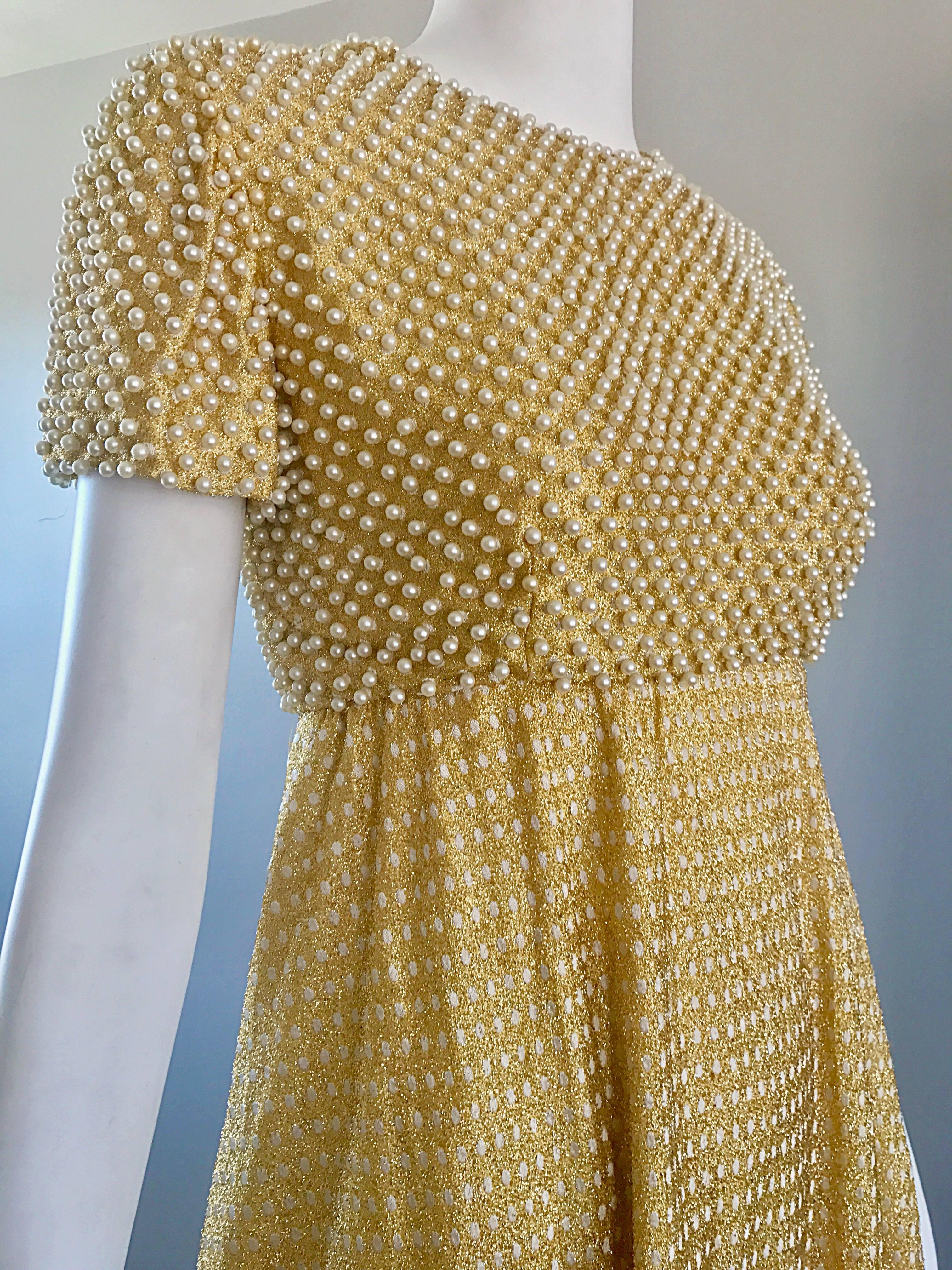 Stunning and rare 1960s GEOFFREY BEENE Couture Gold metallic pearl encrusted silk lurex gown! Features hundreds of hand-sewn white pearls throughout the front and back of the bodice. Fitted bodice with a full skirt. Skirt features white polka dots