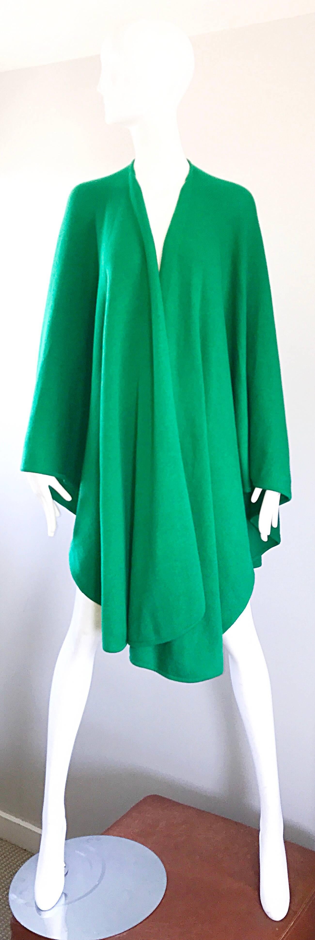 Rare 1970s HALSTON kelly green signature knit cape! Softest cotton knit! Wonderful on, with so much movement. Can be worn with one hem tossed over one shoulder attached with a statement brooch. Simply drapes over the shoulders and arms. Can easily