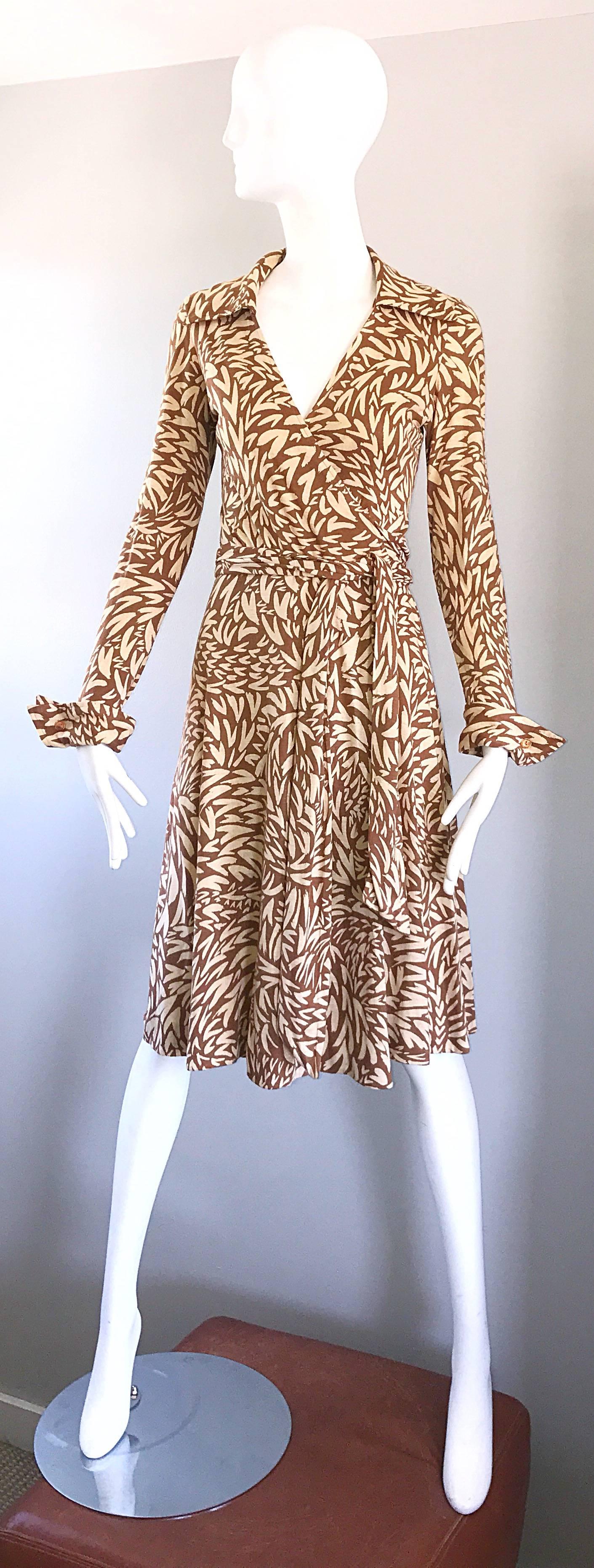 Rare and collectible 1970s DIANE VON FURSTENBERG for JOSEPH MAGNIN iconic heart print wrap dress! This gem is from the beginning of the start of DVF ! Her signature wrap dresses put her on the map as a leading fashion designer worldwide. 
Wonderful