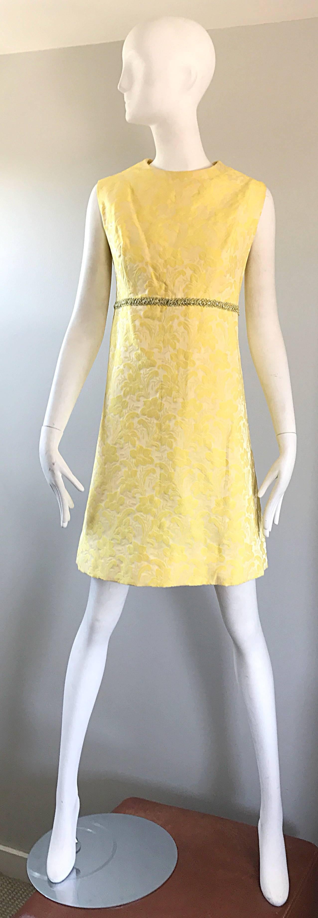Chic 60s vintage MADEMOISELLE canary yellow silk brocade A-Line dress and coat ensemble! Dress features a fitted bodice with a bell shaped skirt. Gold metallic embroidery detail at waist. Hidden. Metal zipper up the back with hook-and-eye closure.