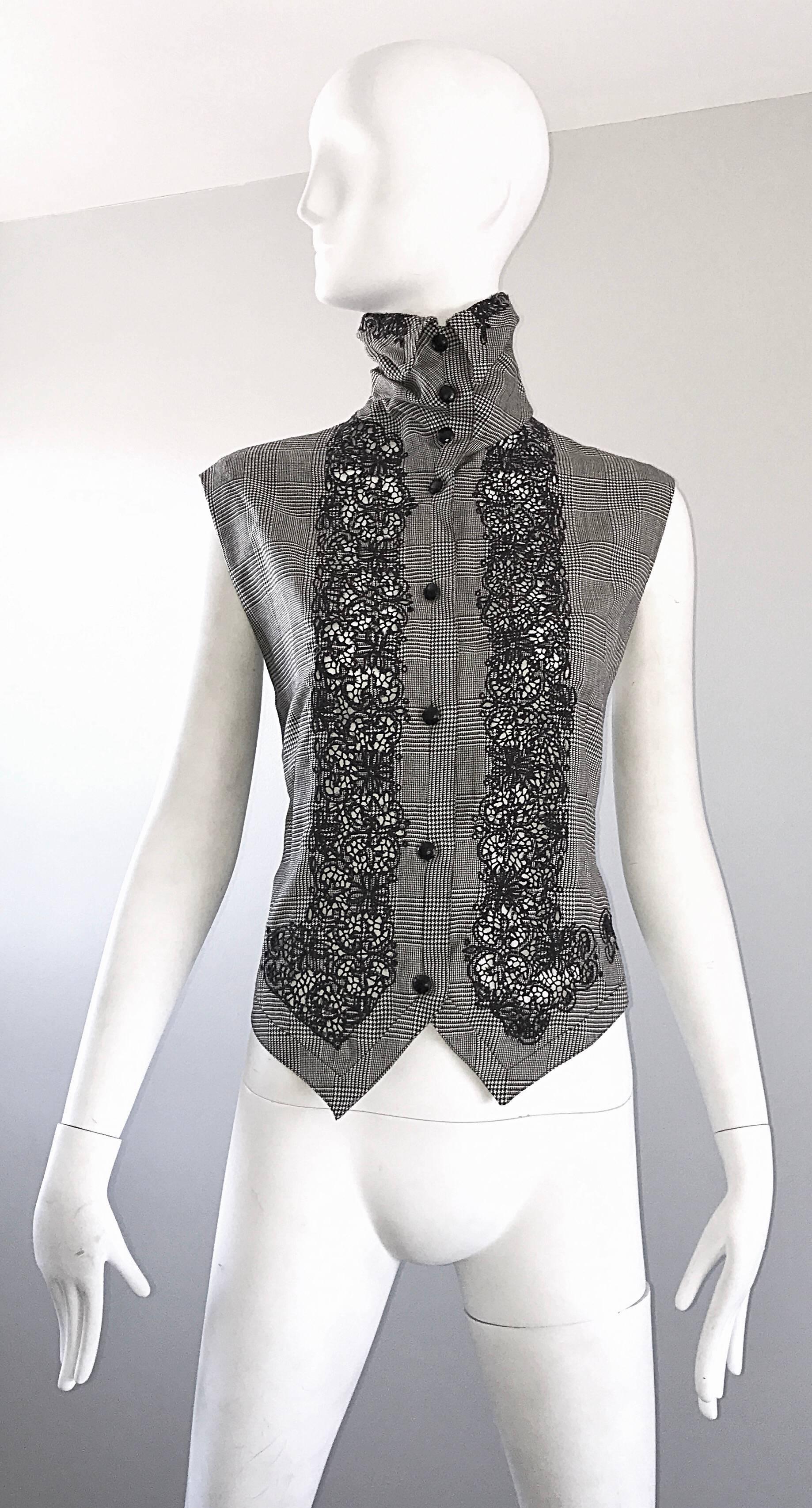 Rare and important vintage GIANNI VERSACE early black and white houndstooth plaid sleeveless dolman sleeve shirt waistcoat ! Perfect layered with a blouse, or alone. Avant Garde style with an asymmetrical hem, and a riches high neck. Black lacquer