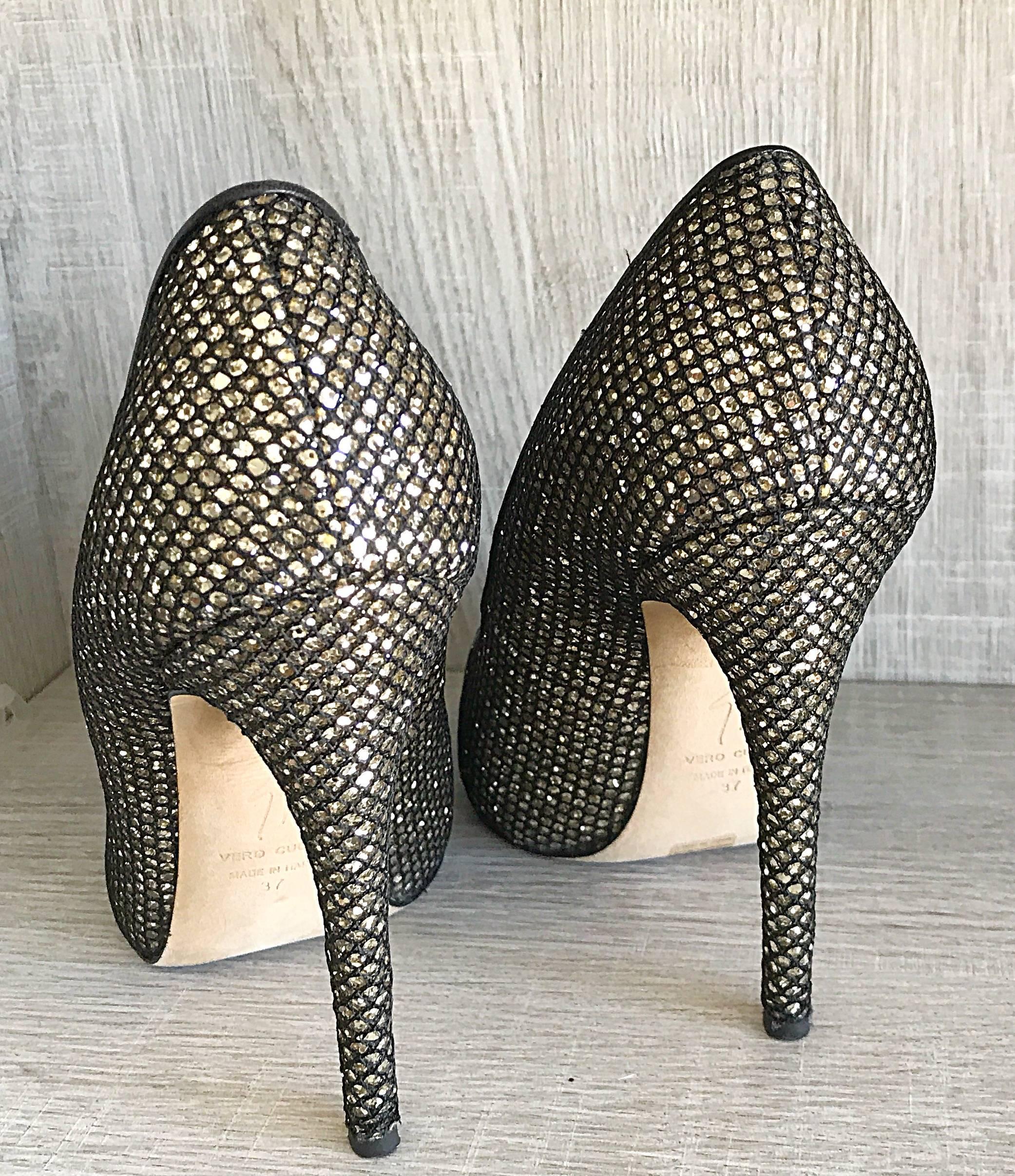 Beautiful GIUSEPPE ZANOTTI black and silver glitter peeptoe heels! Only worn once for a phot shoot, and in perfect condition. Features a hidden platform for extra comfort. A great alternative to a classic black heel. Great with jeans, a dress, or