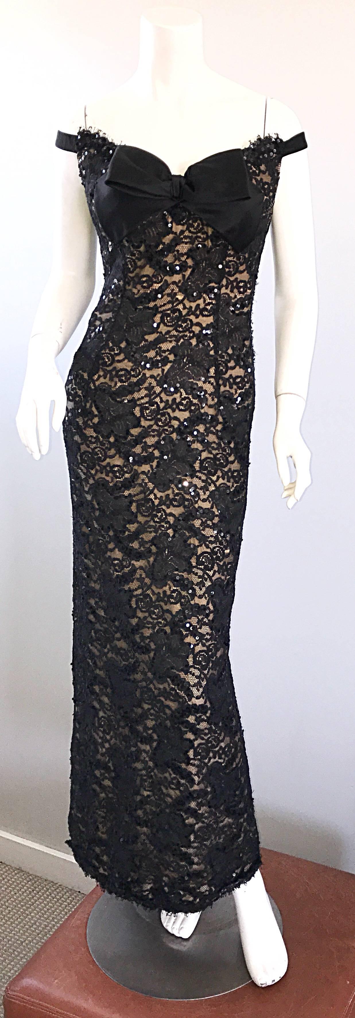 Gorgeous vintage 1990s BOB MACKIE black and nude lace and sequined evening dress! Features a flattering off-the-shoulder silhouette, and a slight train. Nude underlay peaks under the black lace. Thousands of hand-sewn sequins throughout. Black silk