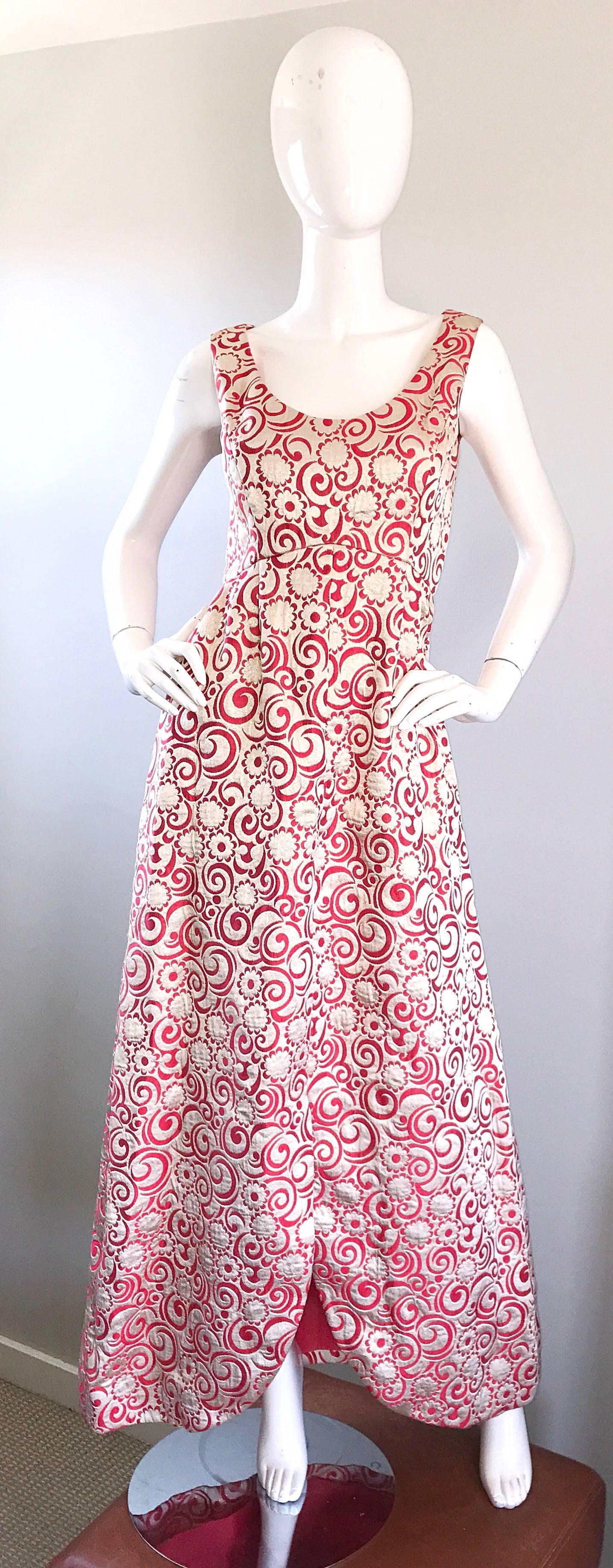 Spectacular 1960s CEIL CHAPMAN gold metallic and raspberry pink silk brocade flowers and swirls printed full length evening dress! Features pink flowers and swirls throughout. Elegant tulip hem creates a dramatic affect when worn. POCKETS at each