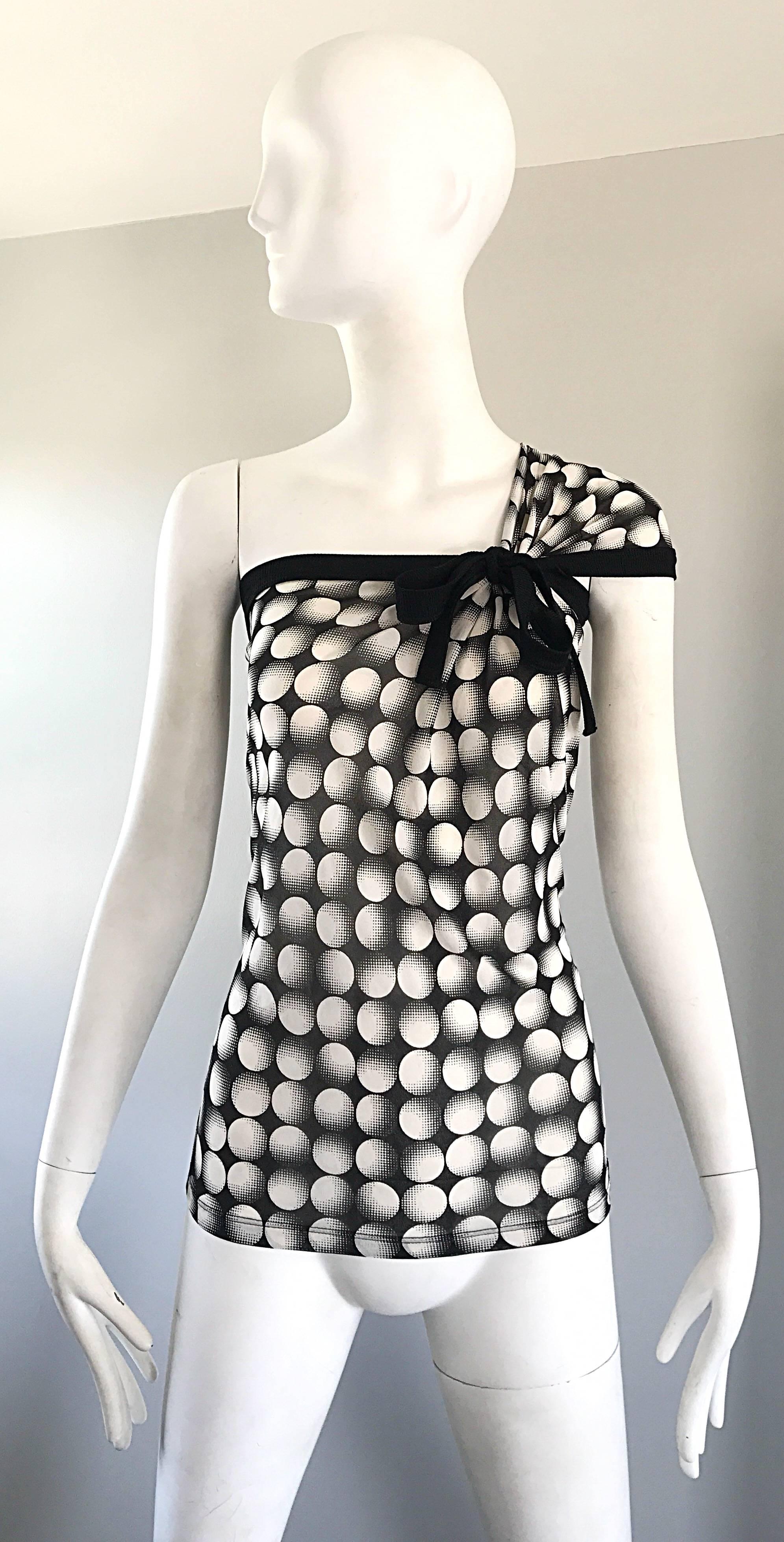 Incredible vintage 90s JEAN PAUL GAULTIER one shoulder black and white op art polka dot blouse (brand new with original store tags attached)! Luxurious silk and rayon blend jersey stretches to fit. Bow above bust can make the bust smaller or larger.