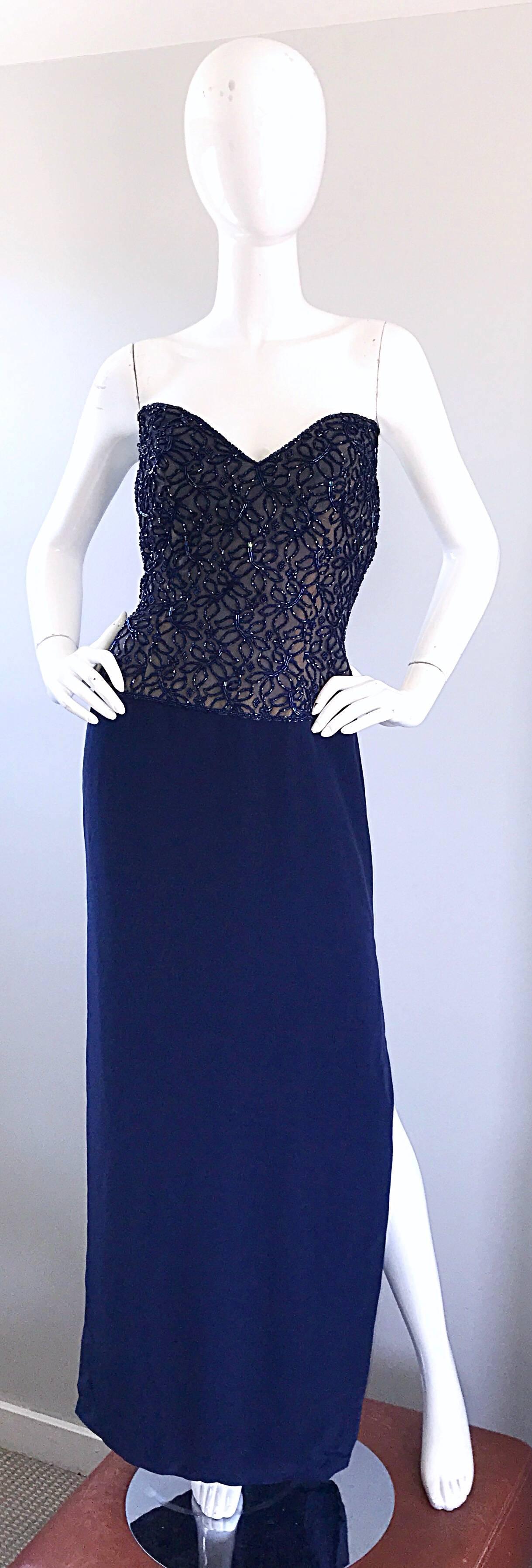 Stunning vintage BOB MACKIE navy blue strapless beaded and sequinened Grecian inspired evening dress! Features hundreds of beads sewn onto navy a navy mesh, with a boned nude underlay. Sexy slit reveals just the right amount of skin. Hidden zipper
