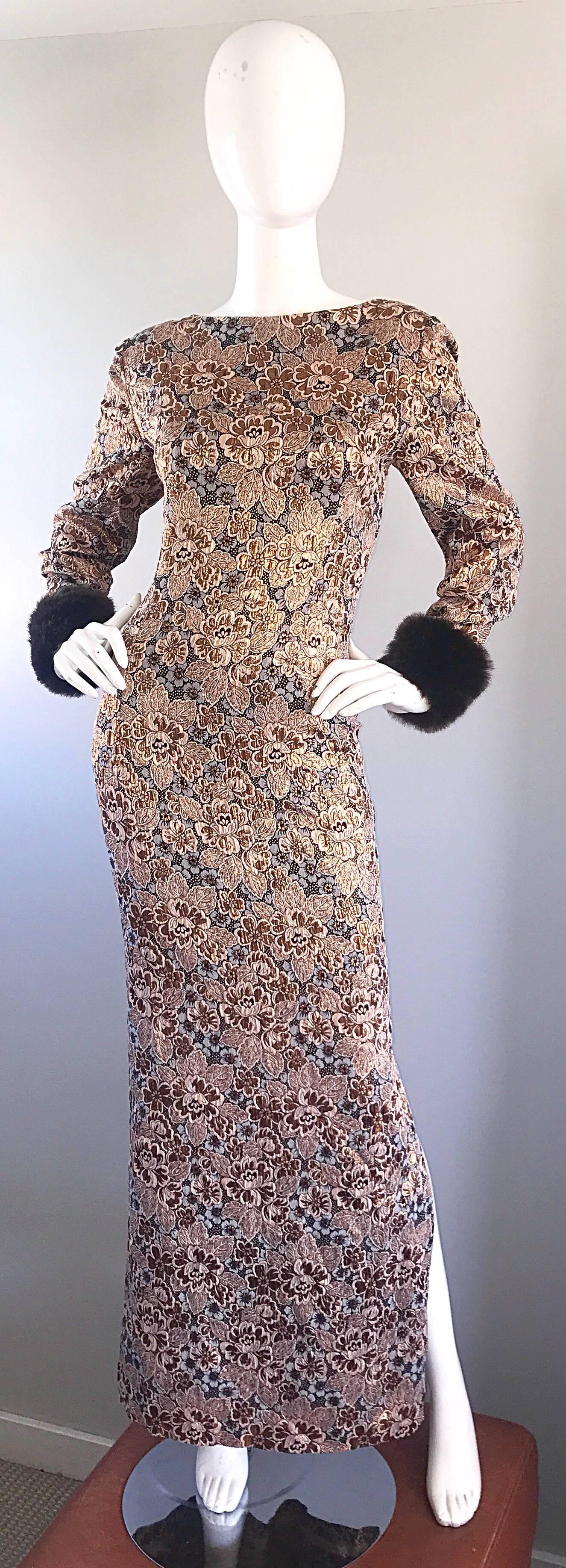 Sensational 60s BILL BLASS demi couture long sleeve faux fur evening gown! Features flower prints in gold, rose gold, and brown on metallic silk. Long sleeves feature brown faux fur cuffs. High neck with a flattering low cut back. Full metal zipper