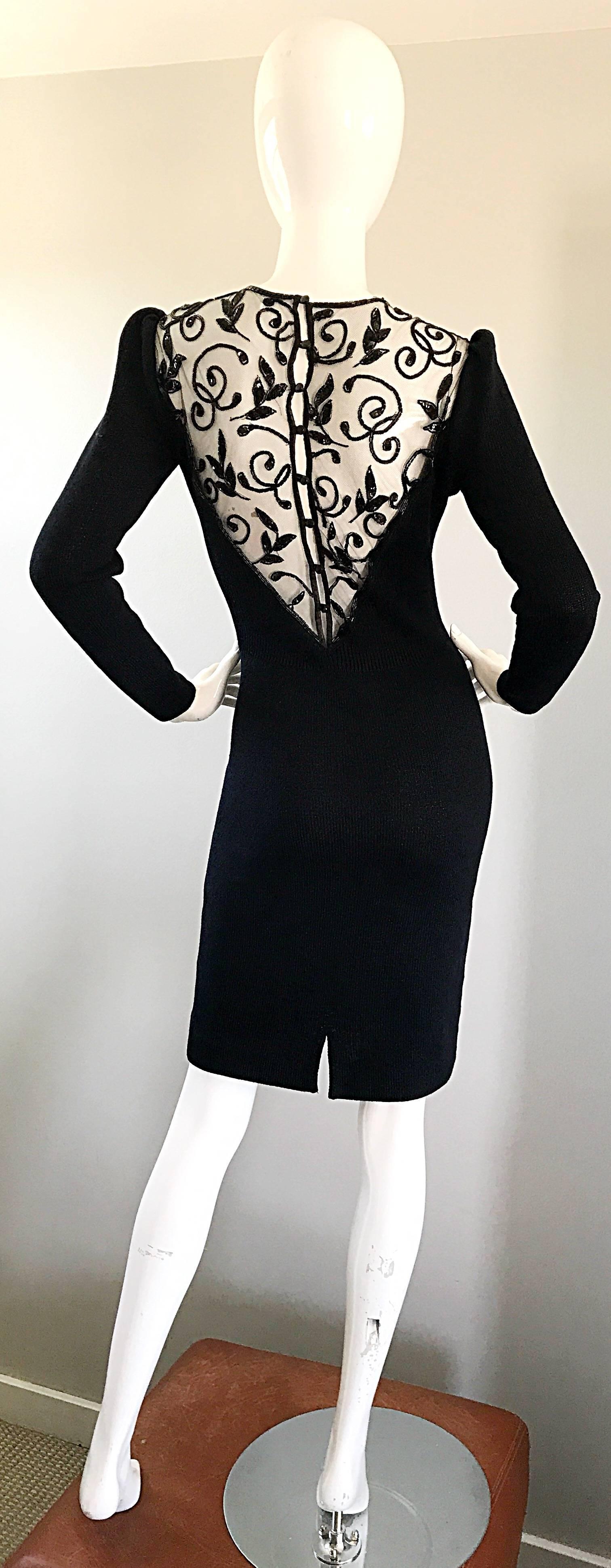 Beautiful 90s ST JOHN by MARIE GRAY Santana knit long sleeve sequined cut out back. Slight chic puff sleeves (no shoulder pads). Smart tailored cut that stretches to fit. Sequin encrusted mesh covers the cut-out back, and above the bust. Black