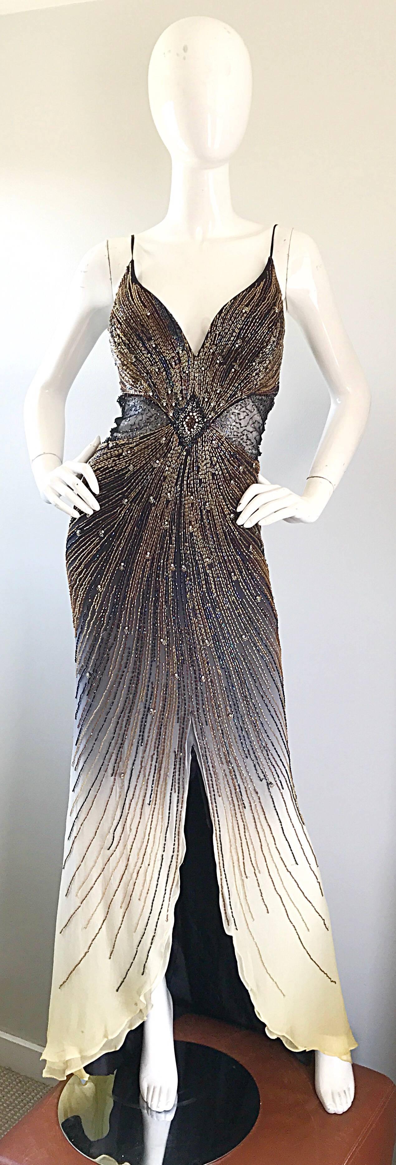 Sexy 1990s black and nude / tan ombre chiffon evening dress! Features cut-out panels at each side of the waist, with mesh panels covering. Thousands of beads and sequins hand-sewn throughout. Dramatic train. Hidden zipper up the back, with