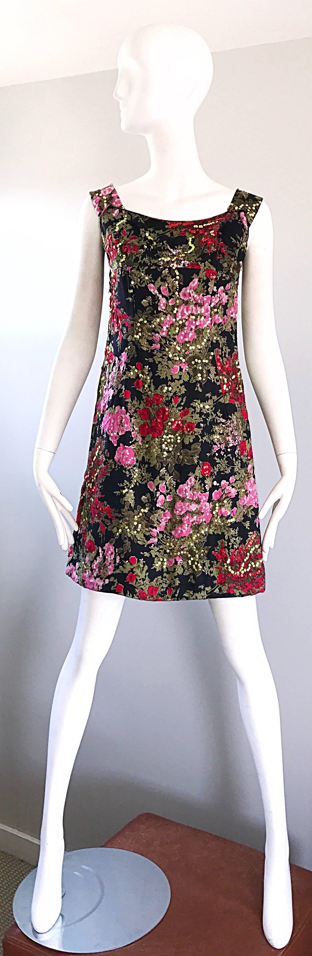 Chic 1960s LORD & TAYLOR black, pink, red and green silk sequin shift dress! Features hundreds of hand-sewn sequins, and a flower print. Full metal zipper up the back with hook-and-eye closure. Fantastic construction, with heavy attention to detail.