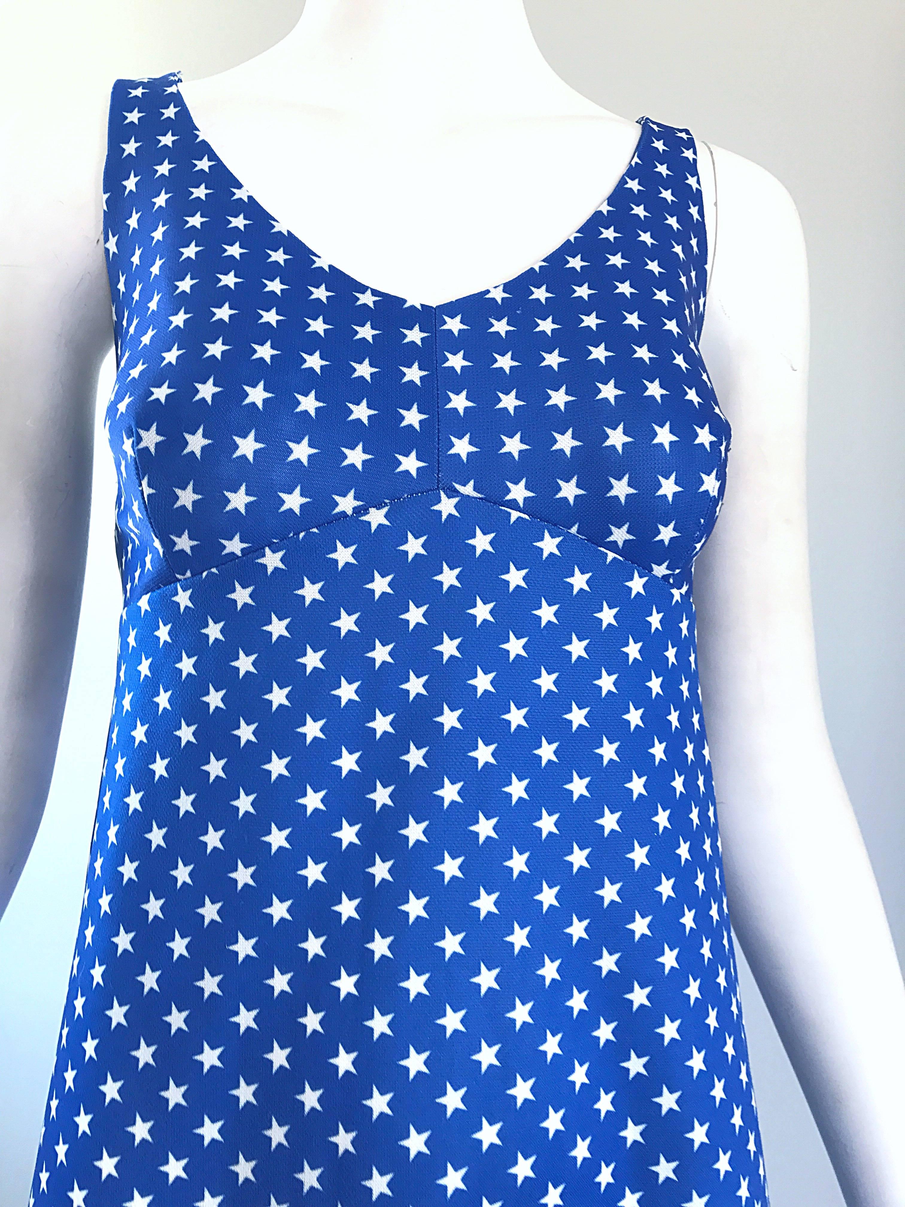 Amazing 1960s royal blue and white star print A - Line dress! Hidden zipper up th eback with hook-and-eye closure. Great with boots, wedges, sandals, heels, flats or boots. Looks fantastic on! In great condition. 
Approximately Size Small- Medium