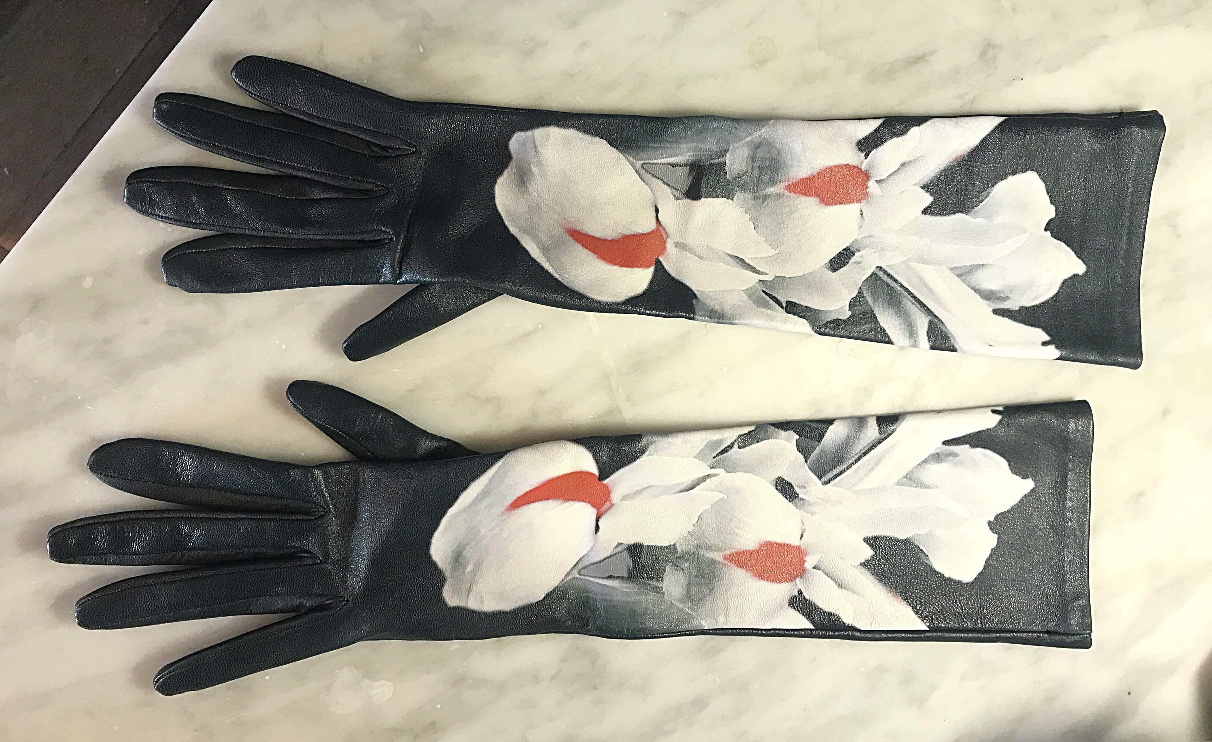 Rare brand new, with original Dior box and dust bag, limited edition CHRISTIAN DIOR, by RAF SIMONS Size 6.5 hand painted Lily flower elbow length leather gloves! For the Fall 2014 Dior line, RAF Simons interpretedDior's garden in six flower mixes