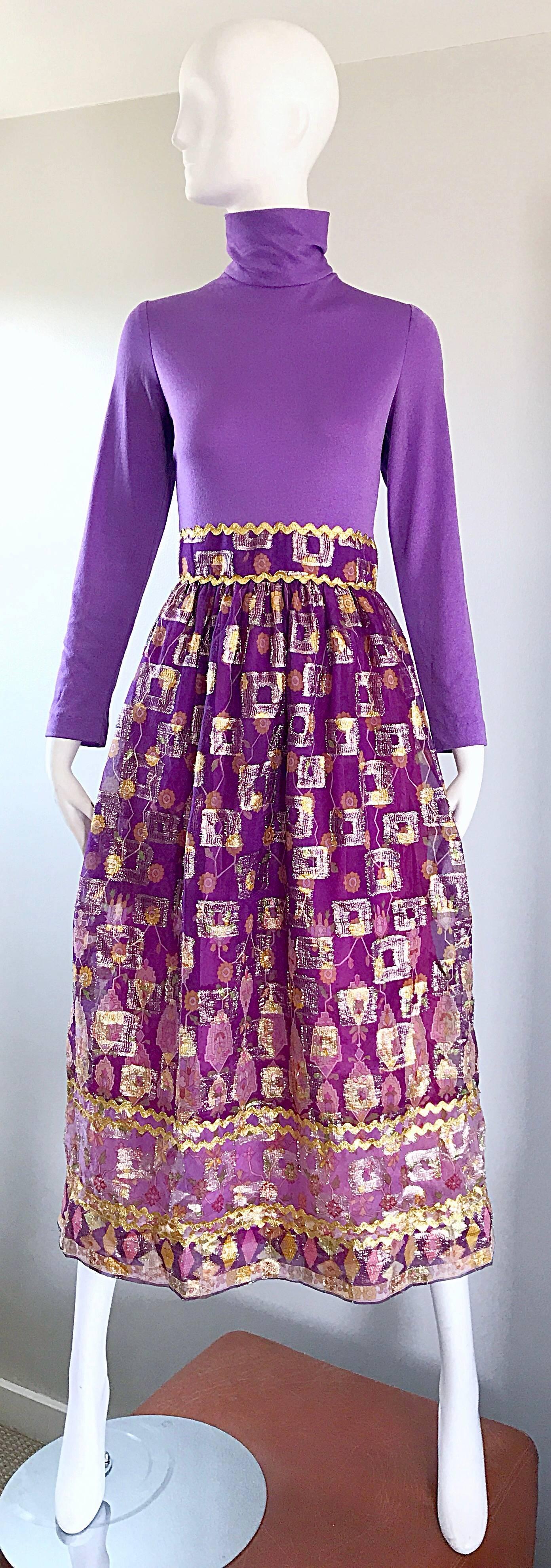Gorgeous 70s ethnic batik print high neck purple / lilac long sleeve ombre midi dress / gown! Features a fitted soft stretch jersey bodice, with a full metallic semi sheer chiffon skirt (fully lined). Hidden zipper up th eback with hook-and-eye