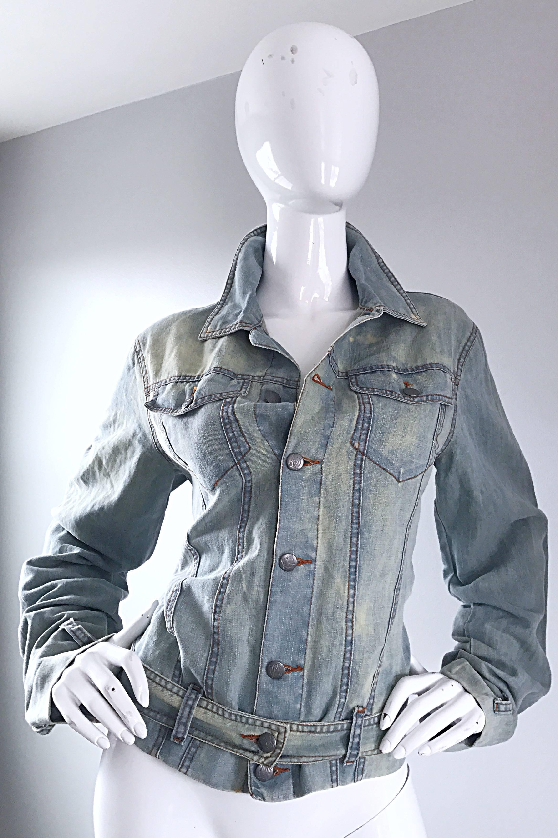 Insane 1990s JEAN PAUL GAULTIER light stone wash lightweight belted denim moto jacket! Features a special treated soft denim fabric. JPG embossed brass buttons up the front. Detachable belt can be adjusted to fit smaller or larger sizes. Pocket at