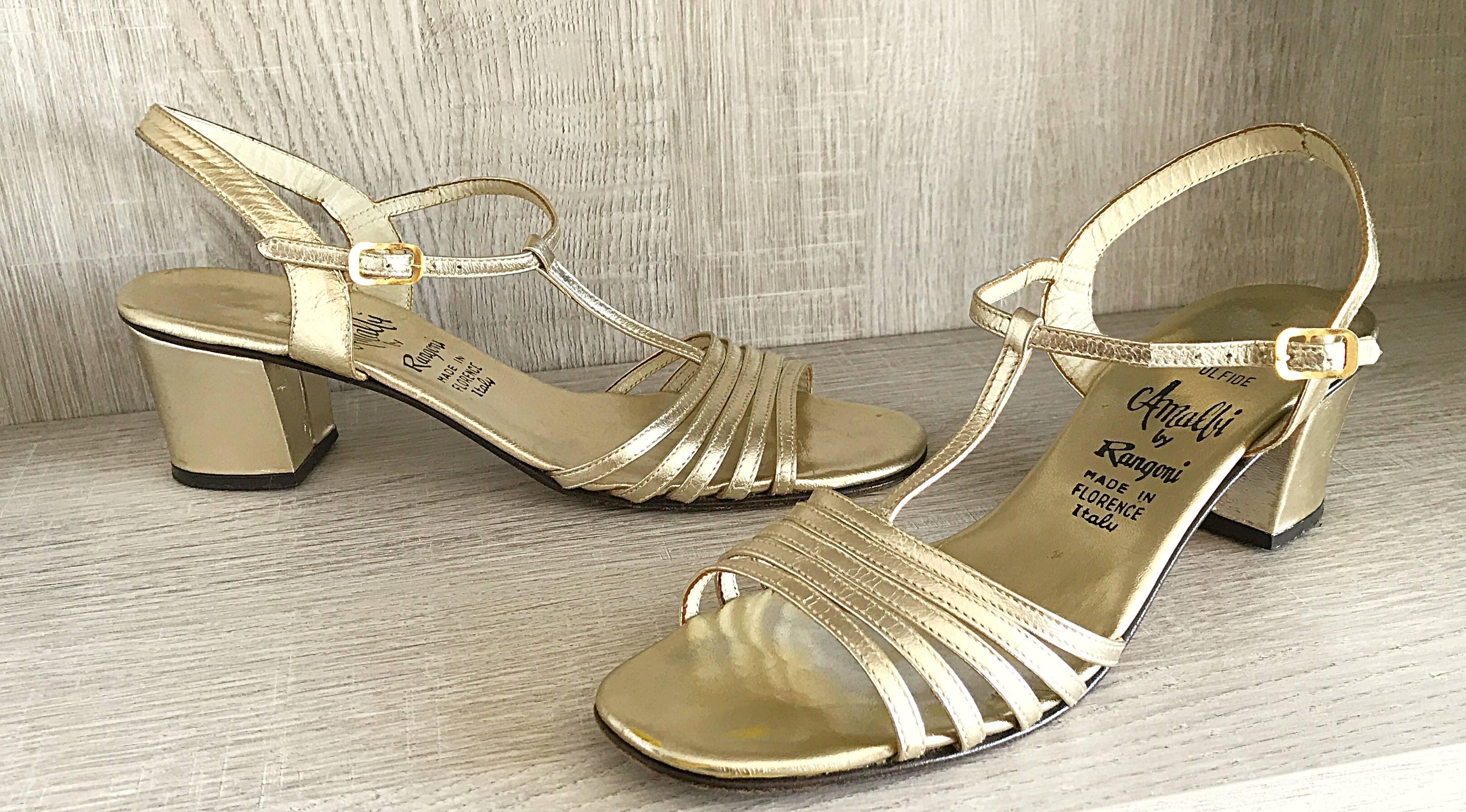 Chic 60s AMALFI BY RANGONI gold metallic leather high heeled Italian sandals! Gold strappy shoes, with so much attention to detail. Adjustable strap. Leather soles. Can easily be dressed up or down. Great with jeans, shorts, a skirt or a dress. In