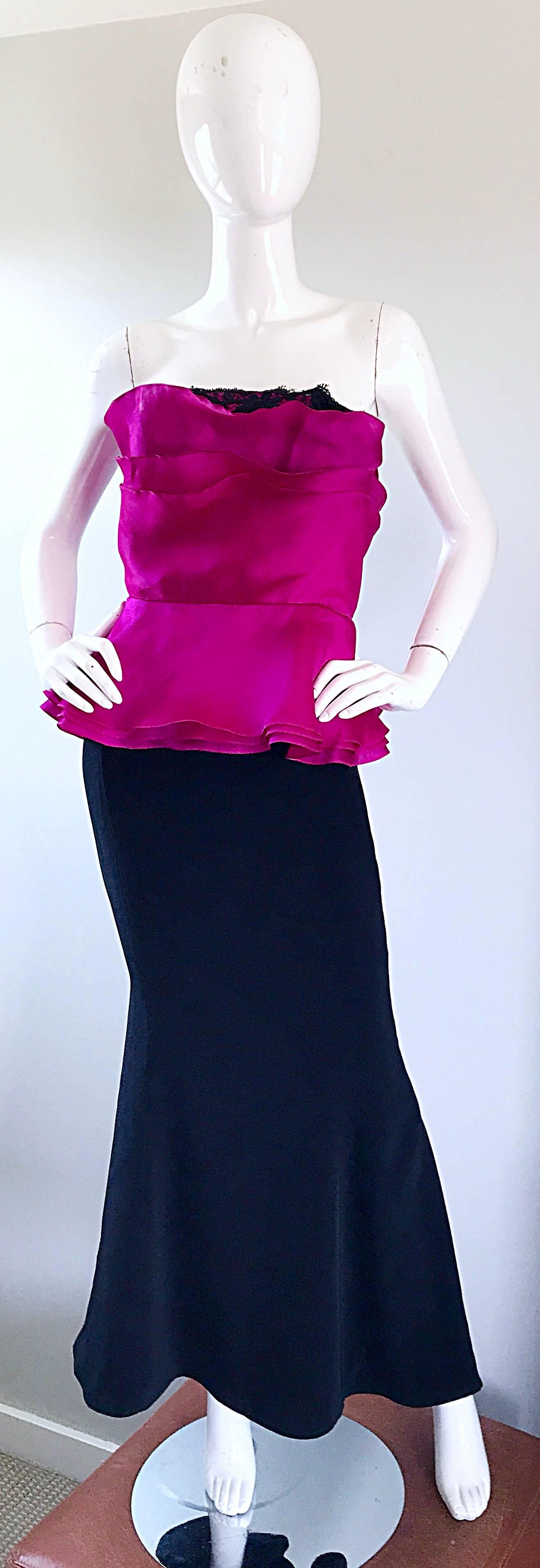 Gorgeous 90s WAYNE CLARK fuchsia and black strapless mermaid evening dress! Features a flattering tiered ruffle bodice, with a black silk flower appliqué on the back. For fitting skirt, which flares at the hem. Fully lined. Hidden upper up the side