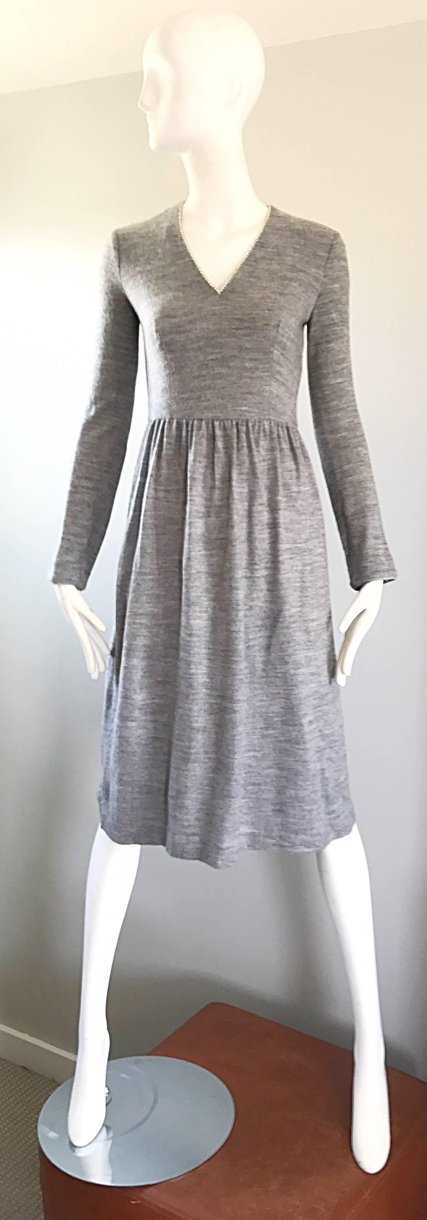 Chic 1970s heather gray and rhinestones long sleeve sweater dress! Soft warm fabric that could possibly be cashmere. Fitted bodice, with a neckline trimmed in rhinestones, and a full skirt. Hidden zipper up the back with hook-and-eye closure. Fully