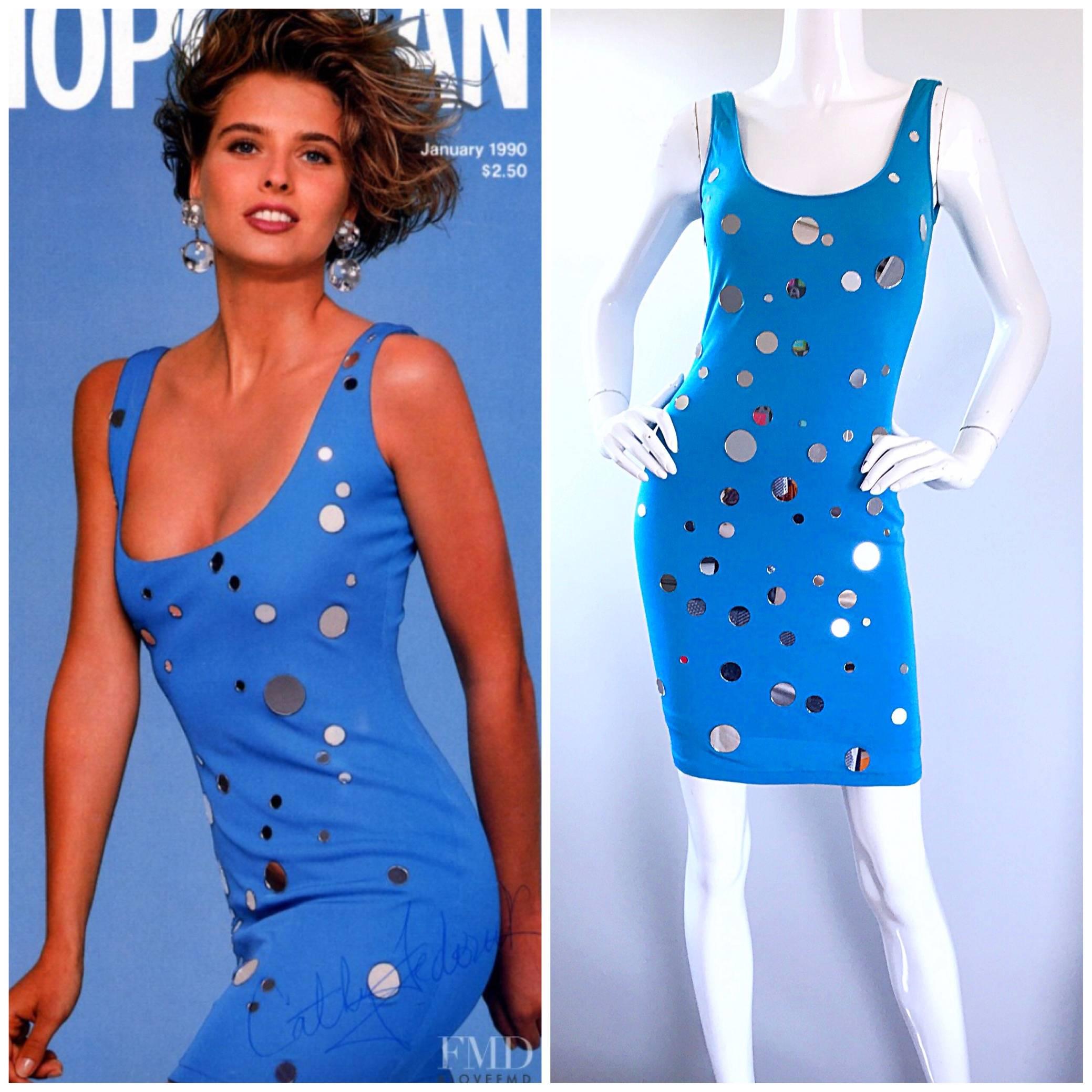 Sexy documented early 1990s / 90s C.D. Greene turquoise blue mirrored stretch jersey bodcon dress! Features dozens of various sized mirrors throughout the front. Photographed on supermodel Cathy Fedoruk on the January 1990s cover of, "