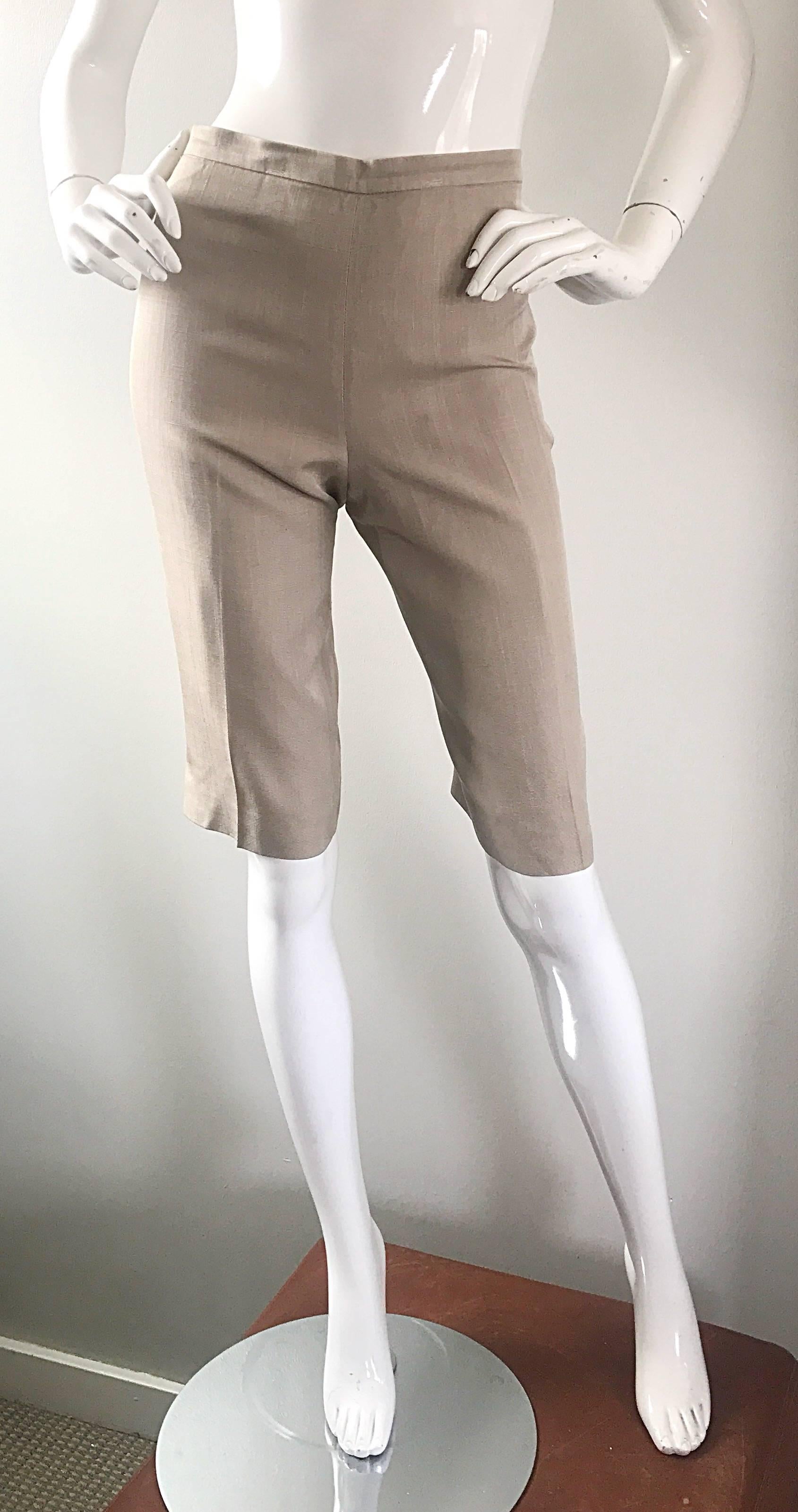 Rare early 90s MICHAEL KORS Collection khaki / beige cropped silk 
pedal pushers / shorts! High waisted fit with sleek tailored legs. Hidden zipper up th eback with button closure. Fully lined. Can easily be dressed up or down. In great condition.