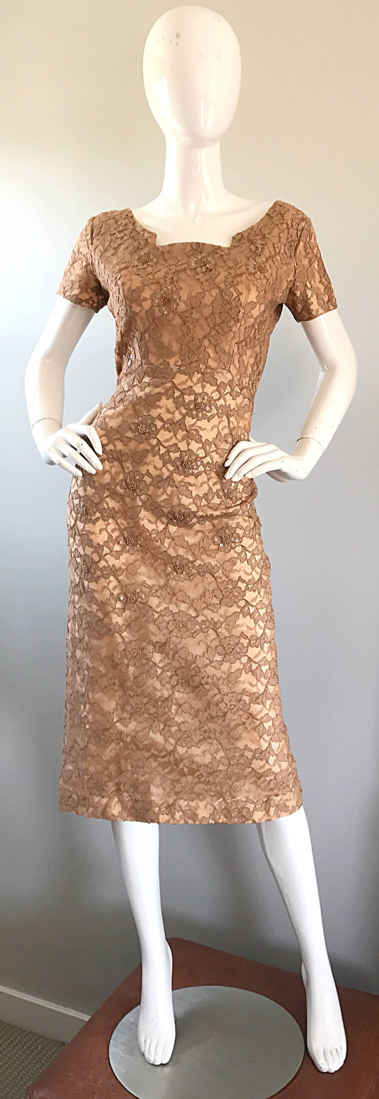 Gorgeous 1950s demi couture nude, tank and beige tea length silk lace cocktail dress! Impeccable construction, with so much heavy attention to detail. Fitted bodice features hundreds of hand-sewn iridescent sequins and beads throughout. Skirt