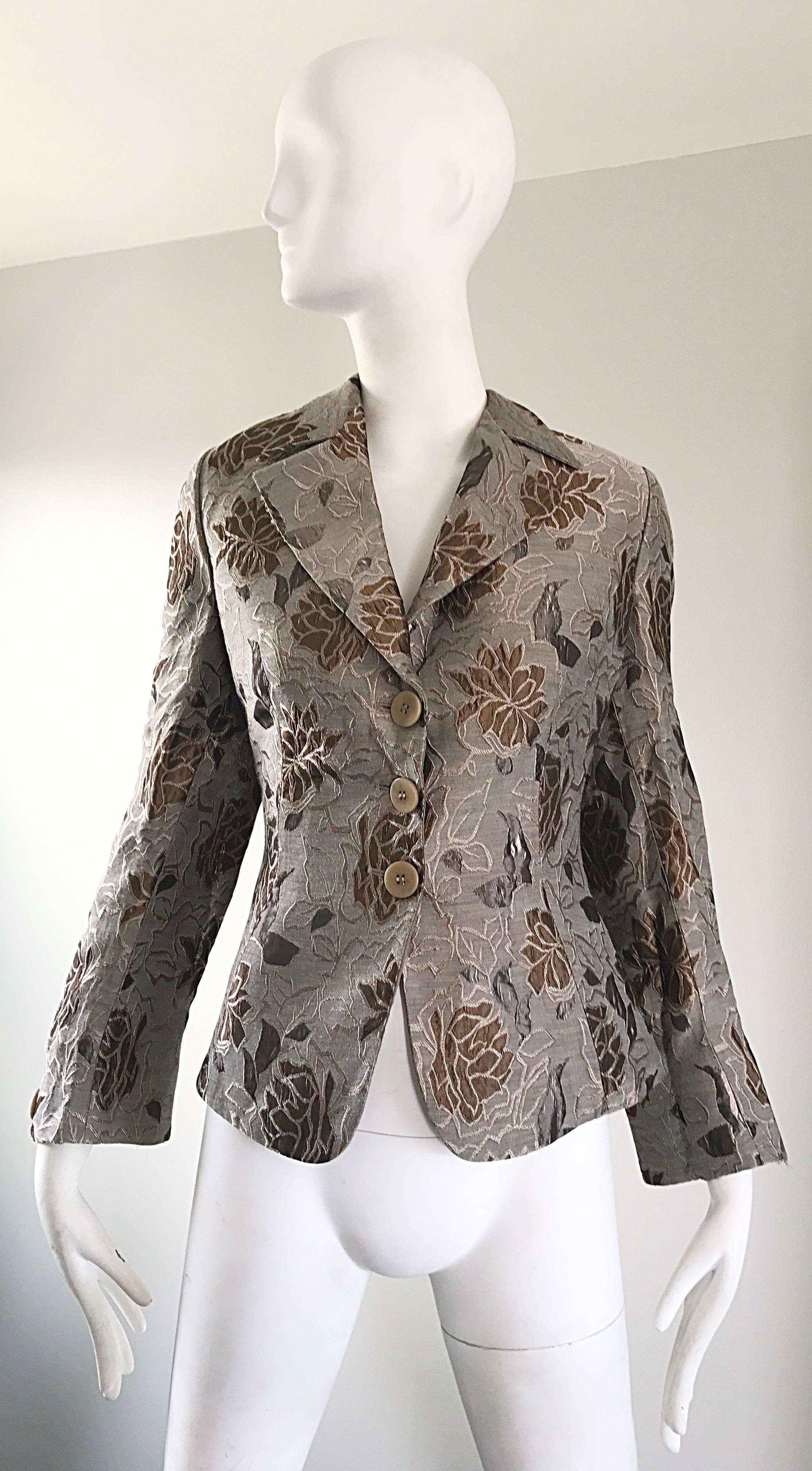 Beautiful 1990s GIORGIO ARMANI COLLEZIONI gray, taupe and brown silk blazer jacket! Features a muted flower scene is warm hues. Three buttons up the front. Fully lined. Sleek tailored fit. Beautiful silk that gives off the slightest, yet wonderful