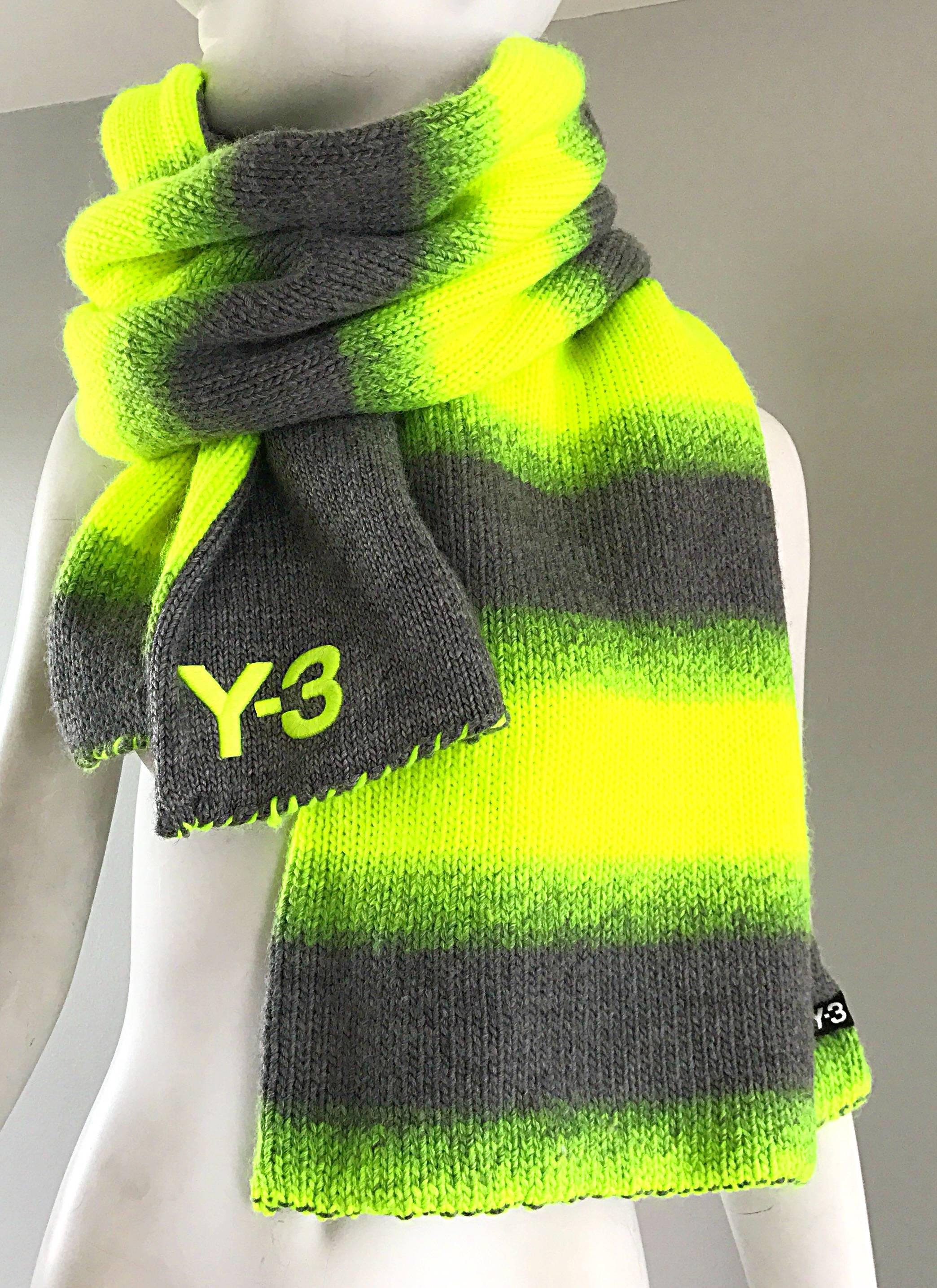 Unisex YHOJI YAMAMOTO Y-3 bright neon tennis ball yellow and gray oversize wool blend reversible scarf! One side features neon yellow and gray stripes, while the other side is a solid gray. Super soft wool and acrylic blend. 
The perfect everyday