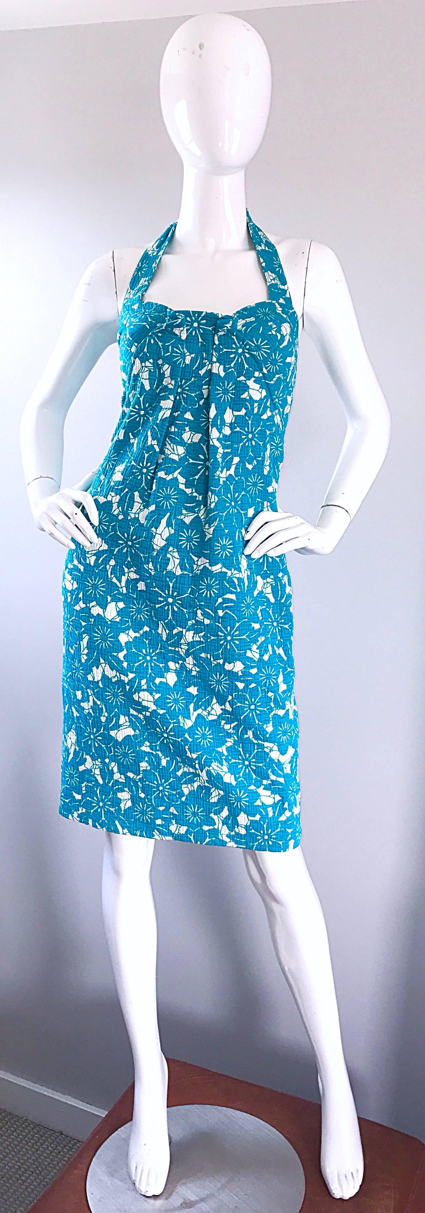 Chic vintage OSCAR DE LA RENTA turquoise blue and white Hawaiian tropical print empire waist halter dress! Features a luxurious thick cotton that is fully lined in silk. Hidden zipper up the back with hook-and-eye closure. Ties at the back neck.