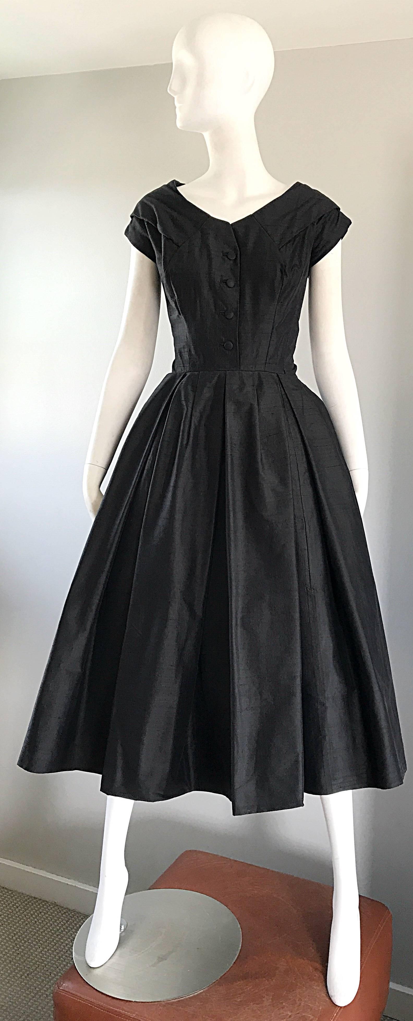 Rare 50s CHRISTIAN DIOR Haute Couture numbered "New Look" black silk shantung dress! Features a well tailored fitted bodice, with an incredible full skirt. Full metal zipper up the back with hook-and-eye closures. Built in interior support