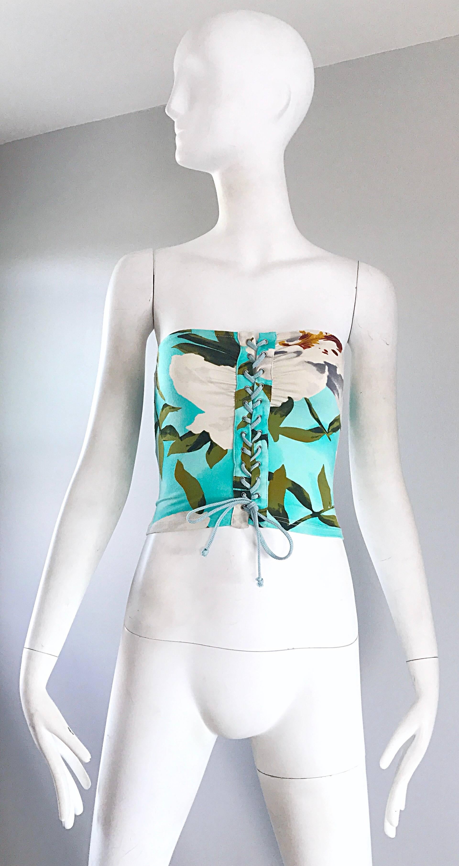 Sexy mid 90s CACHAREl bodycon strapless cropped tube top! Teal blue background, with a tropical print in vibrant green, pale grey, ivory and brown. Matching blue cotton laces up the fron to adjust size. Soft Viscose (93%)  and Elastane (7%)
