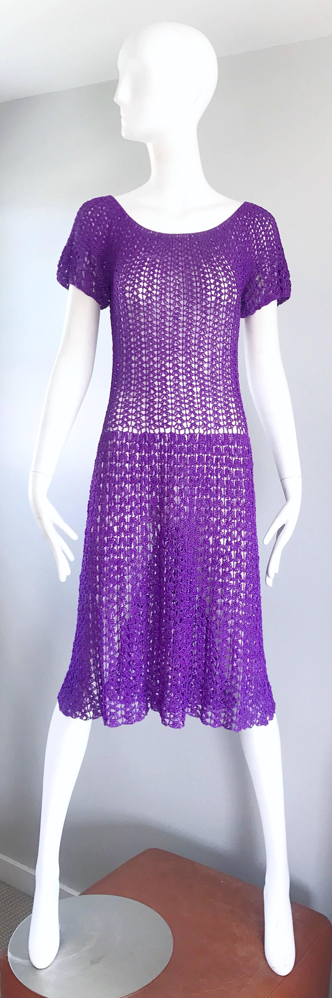 Absolutely wonderful 1960s purple Italian rayon hand crochet knee length dress! The construction on this hard-to-find beauty is impeccable! Completely sewn by hand, with an expert eye to detail. Definitely has an ode to the 1930s, as did a lot of
