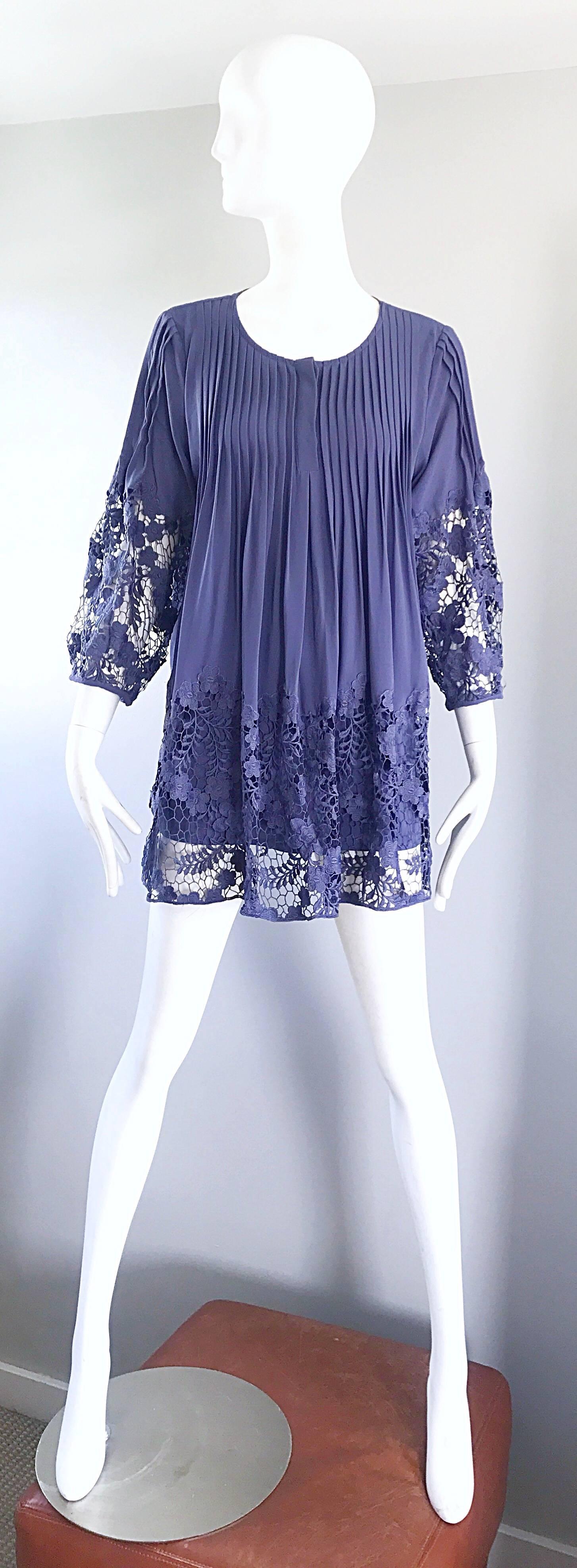 Chic 90s ENZO GEVONNI Italian made perwinkle silk and rayon babydoll mini dress or tent tunic top! Features accordion pleating detail at the bodice that lead into wider pleats towards the hem. Hand crochet flower details at the full bishop sleeves,